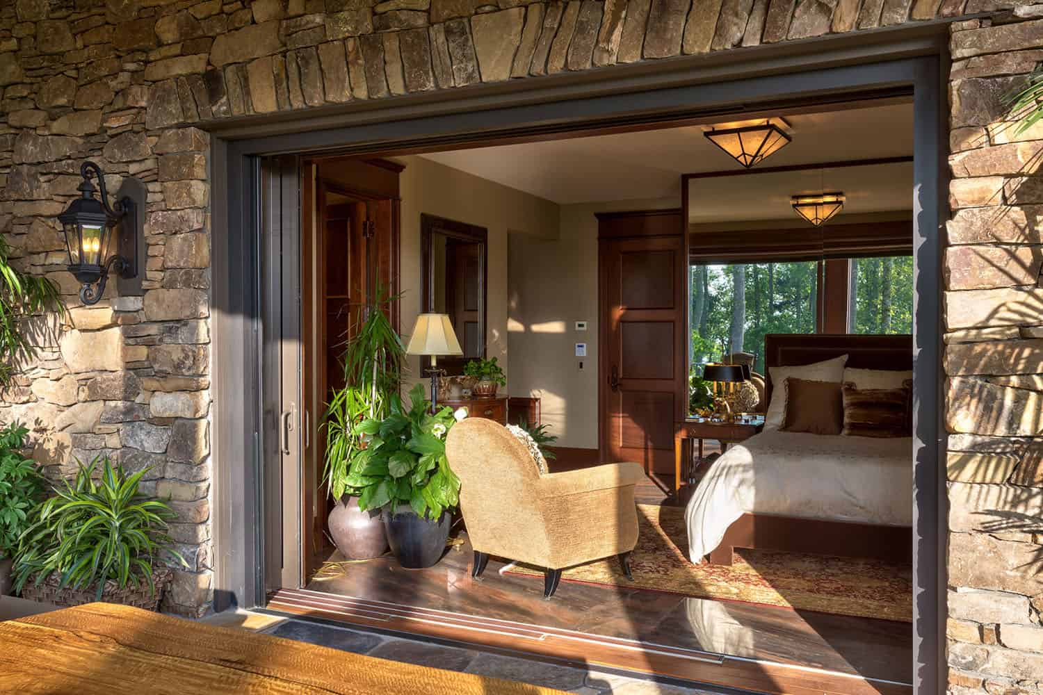 modern rustic mountain guest house bedroom with a private balcony