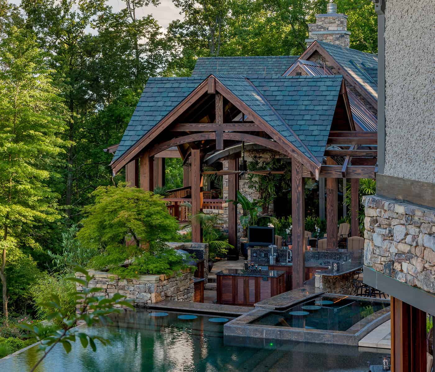modern rustic mountain exterior with a pool