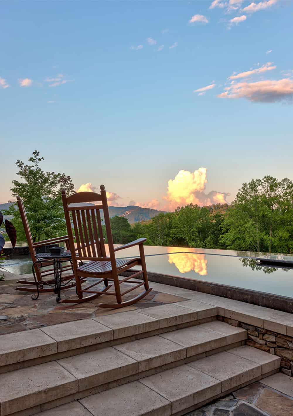 modern rustic mountain exterior with a pool