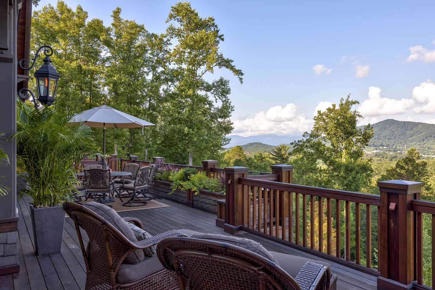 modern rustic mountain home exterior deck with a view