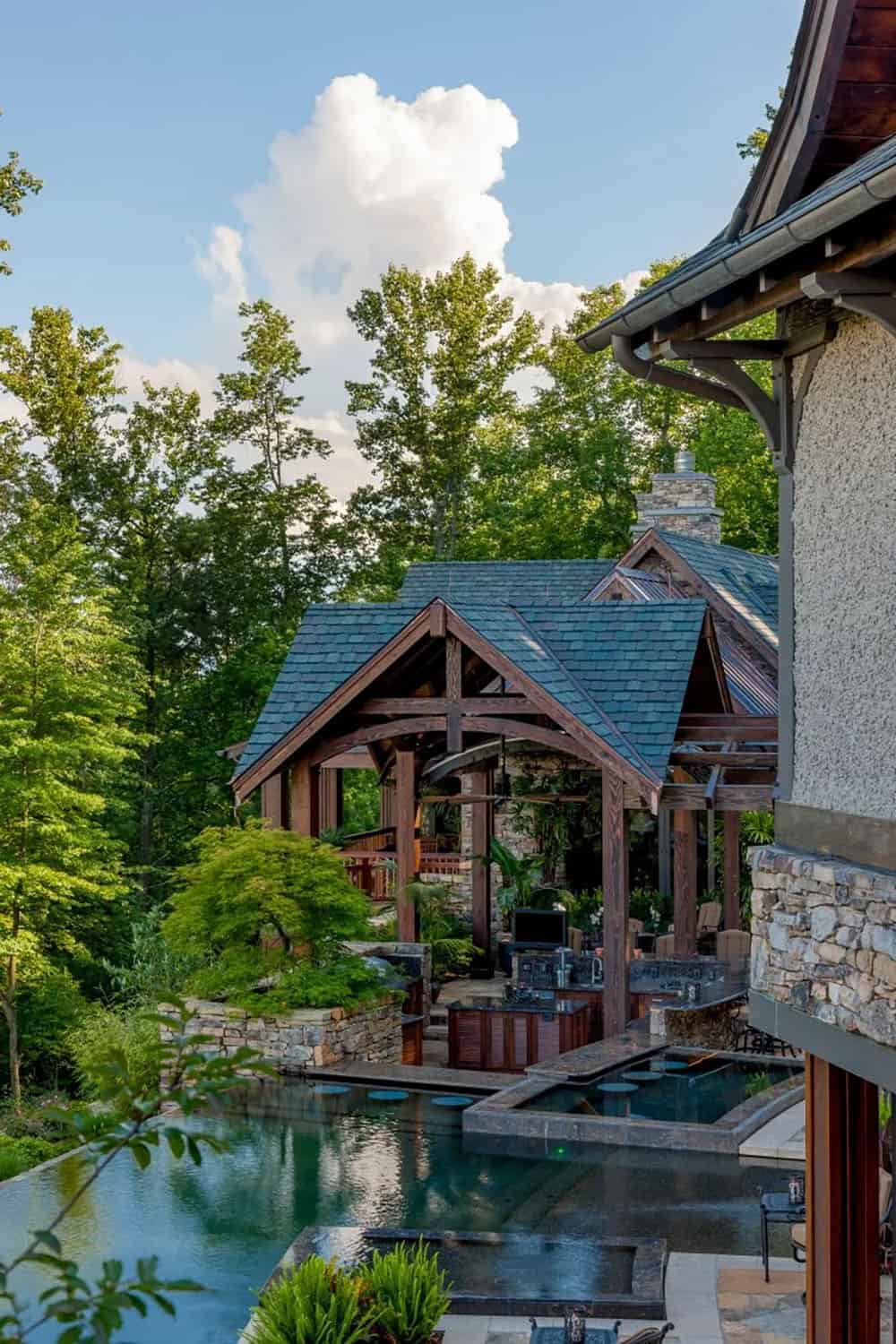 modern rustic mountain exterior with a pool