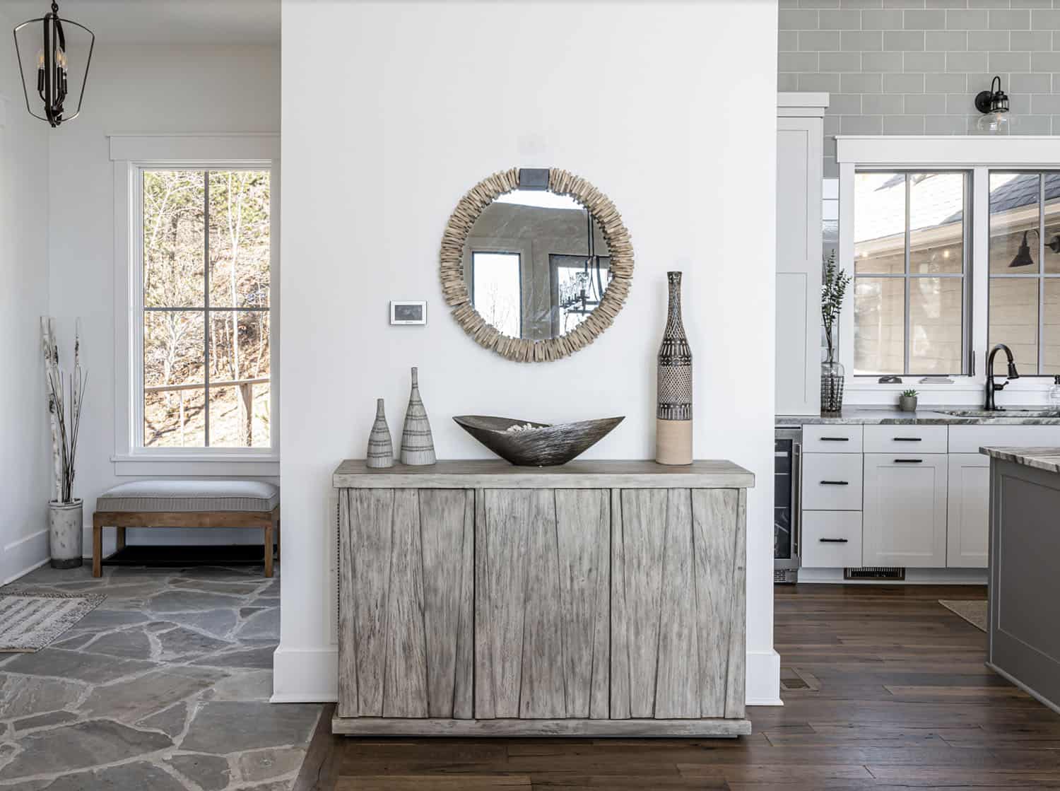 modern rustic mountain home entry with a console table