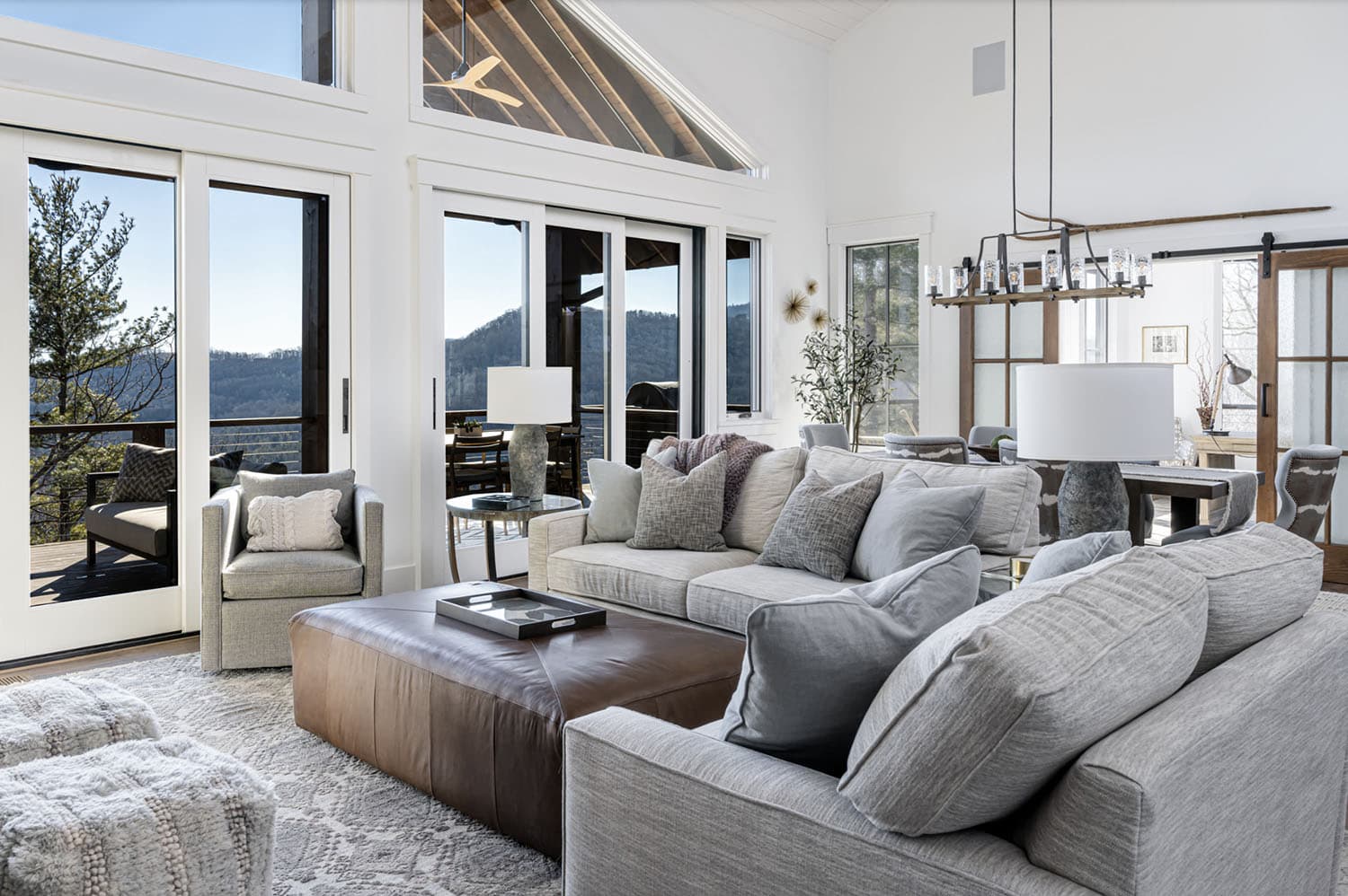 modern rustic living room with large windows
