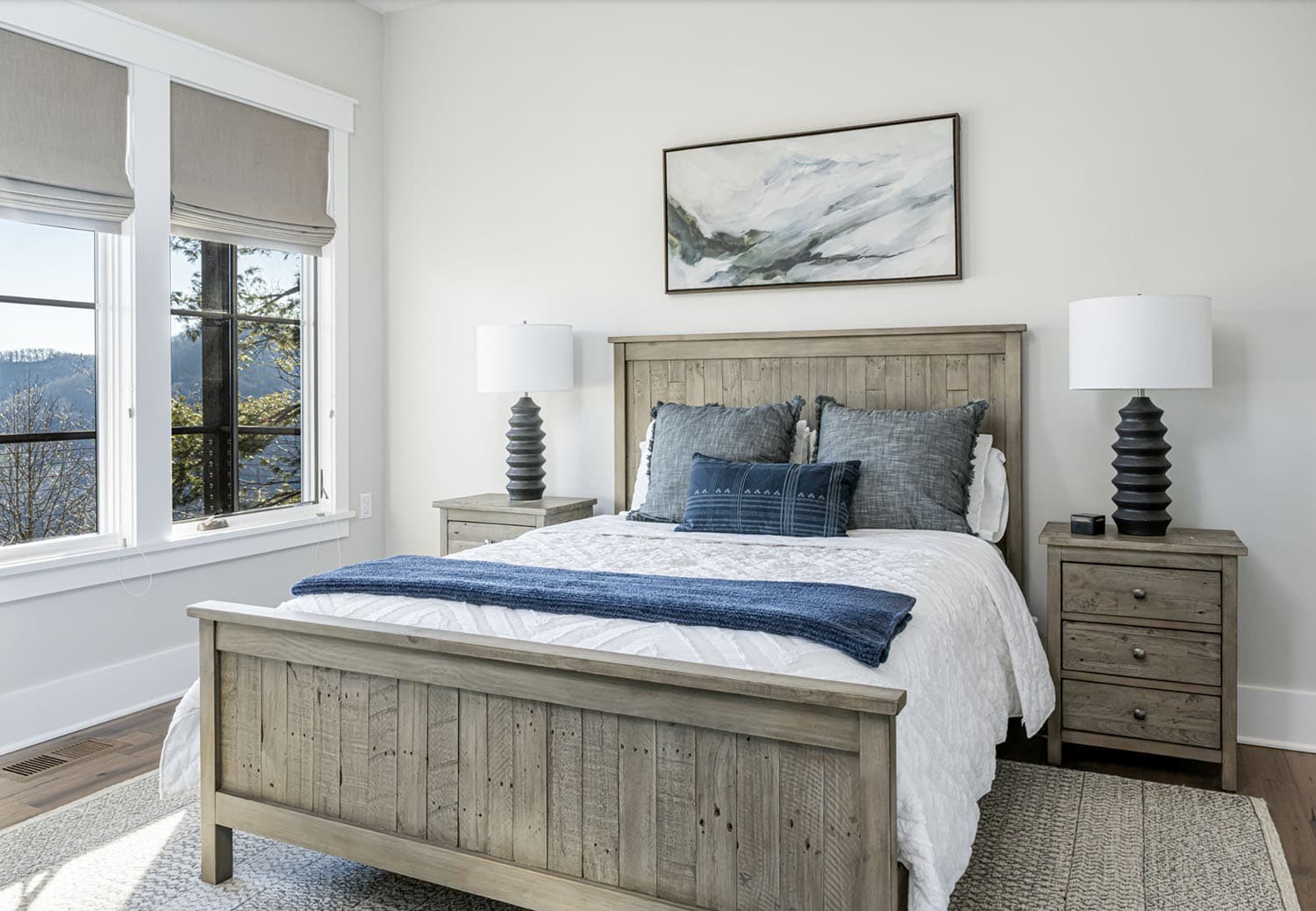 modern rustic bedroom with artwork on the wall