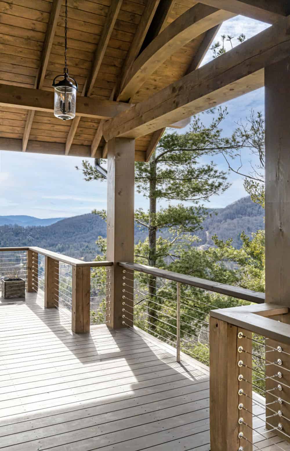modern rustic mountain home exterior with a deck