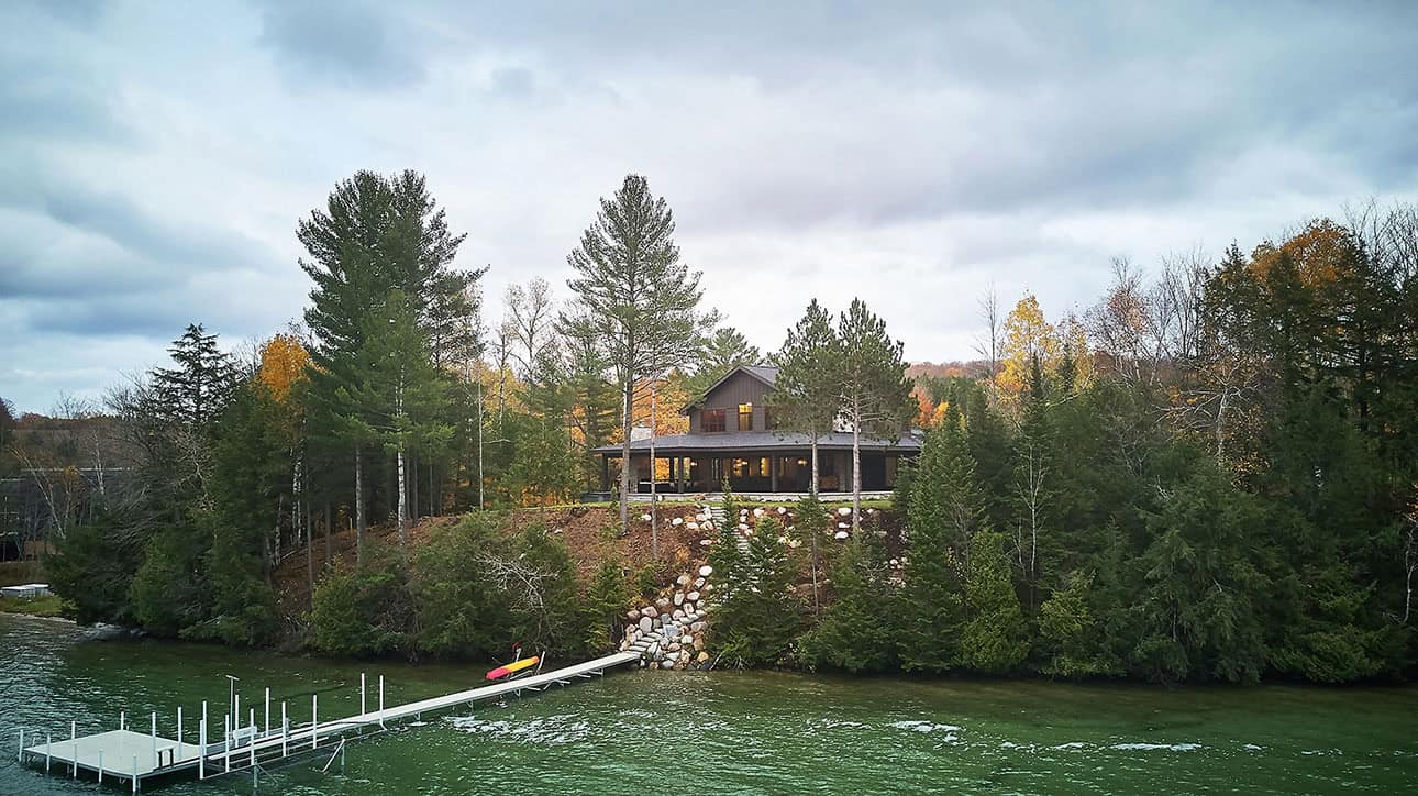 mountain style lake cottage exterior