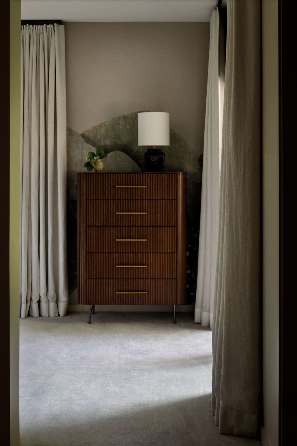 contemporary bedroom with a dresser 