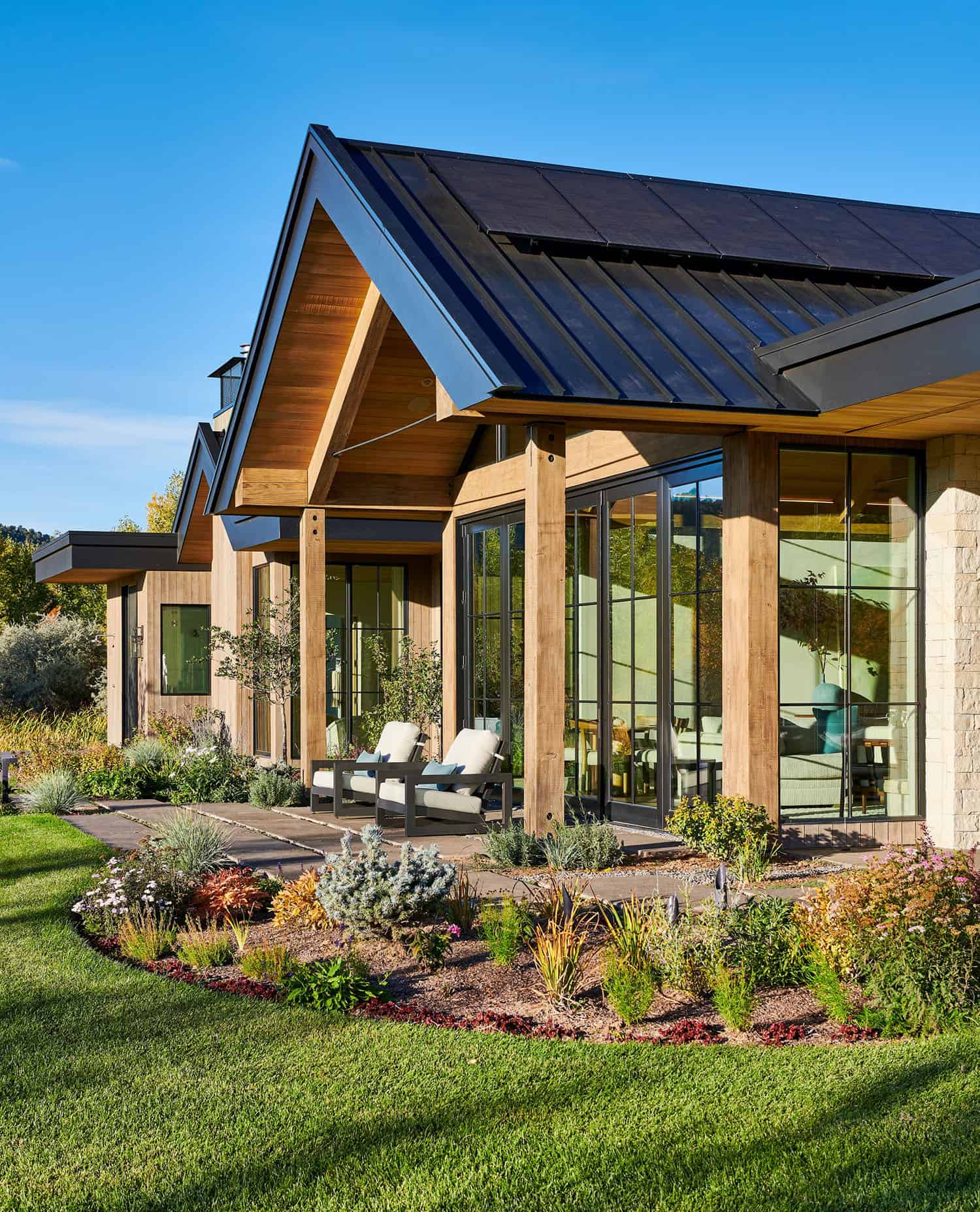 rustic modern riverfront home exterior