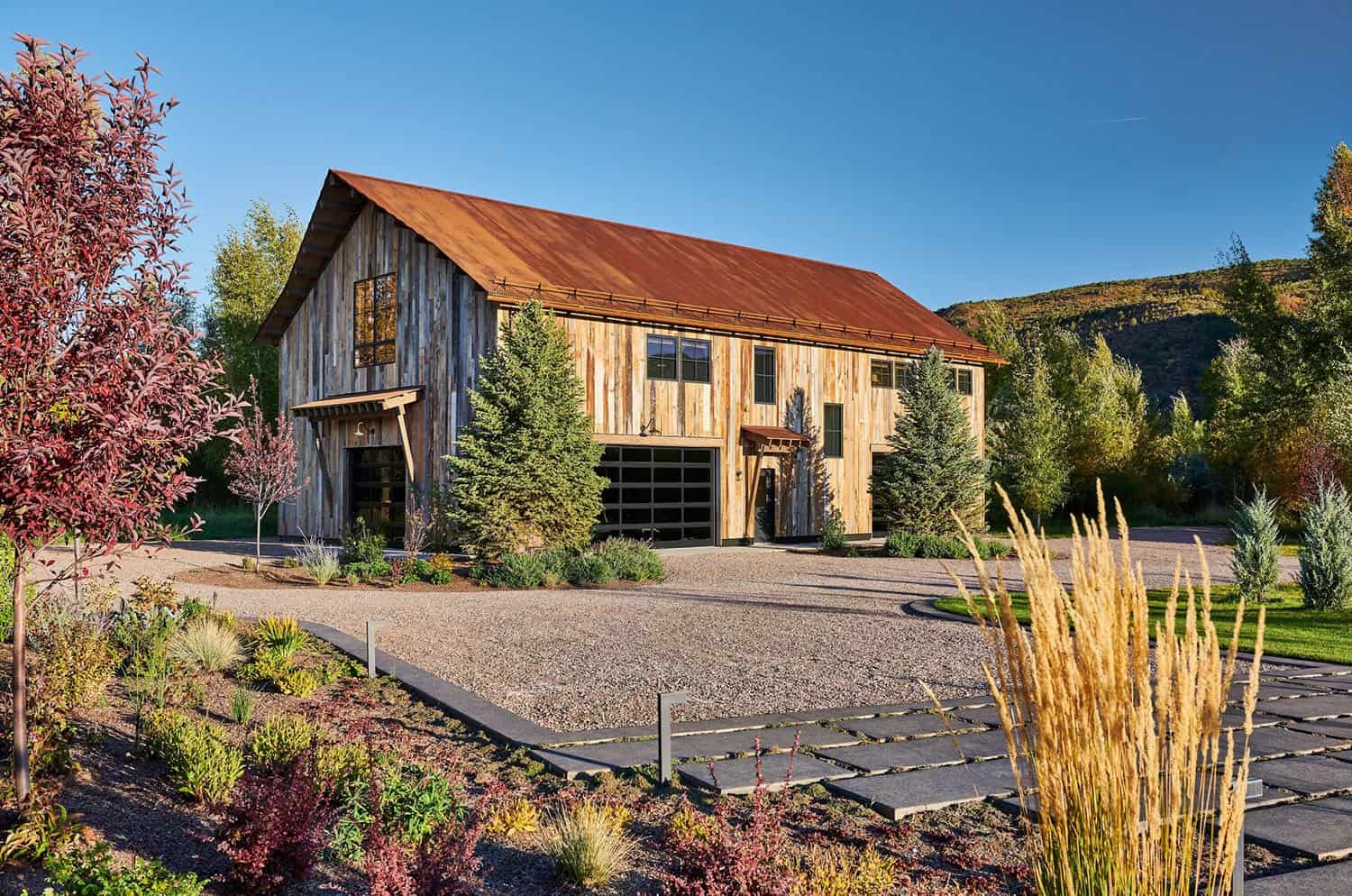 rustic modern riverfront home entertainment barn exterior