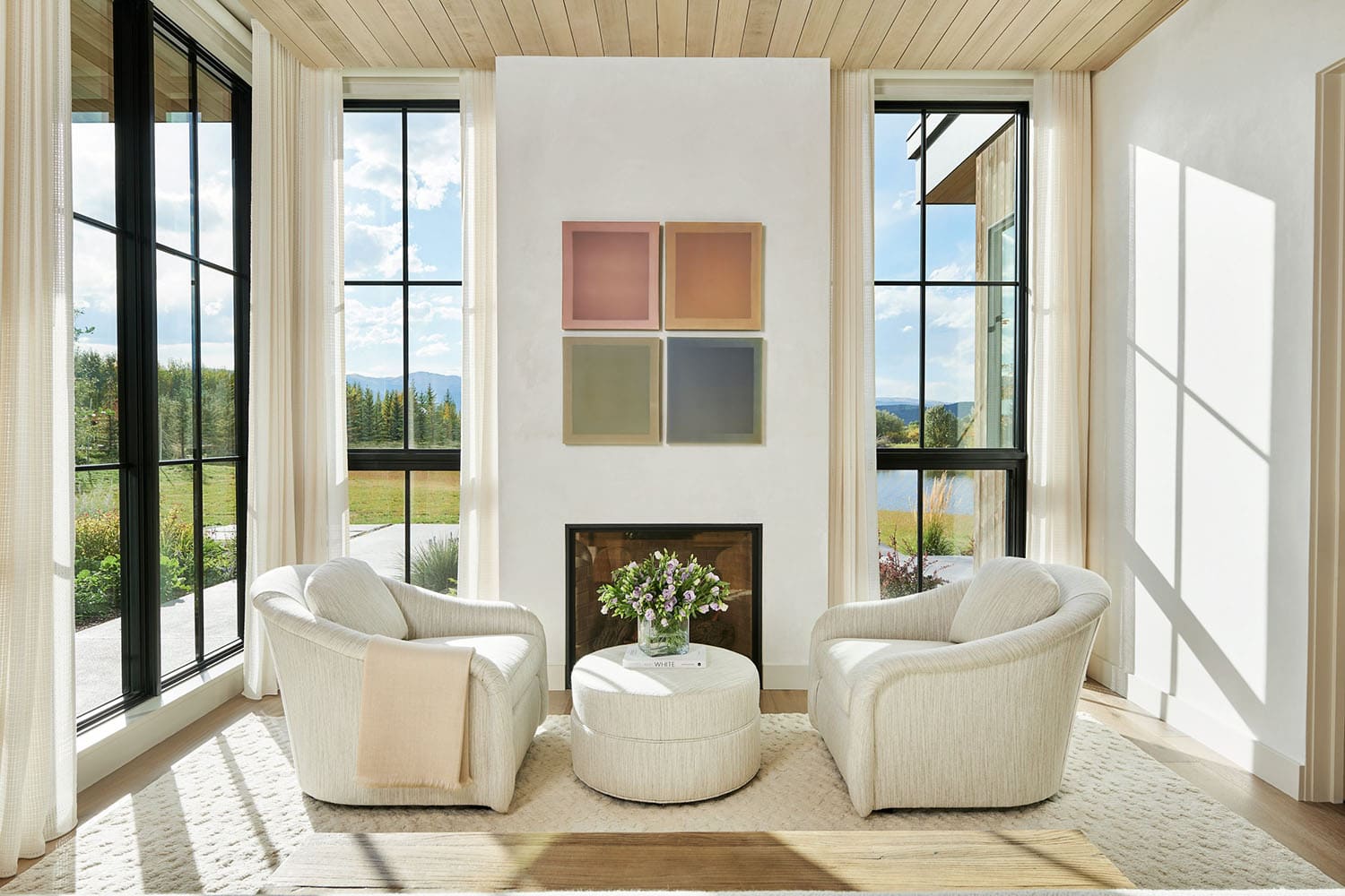 rustic modern bedroom sitting area with a fireplace