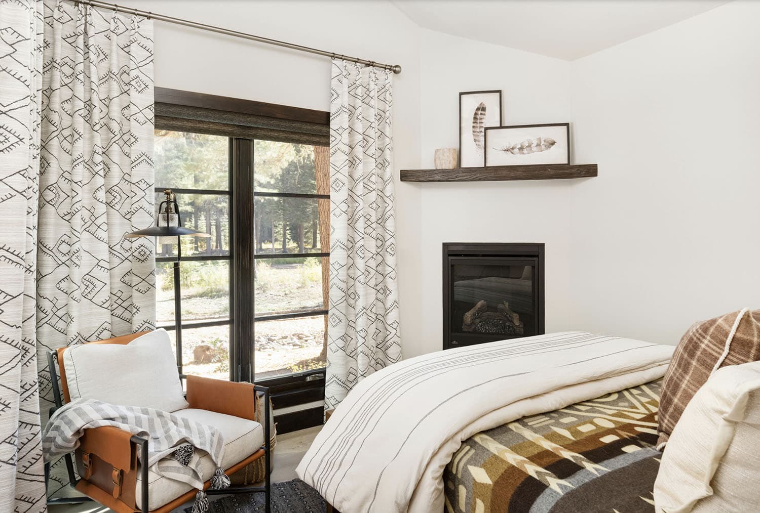 Rustic Bedroom with a Fireplace