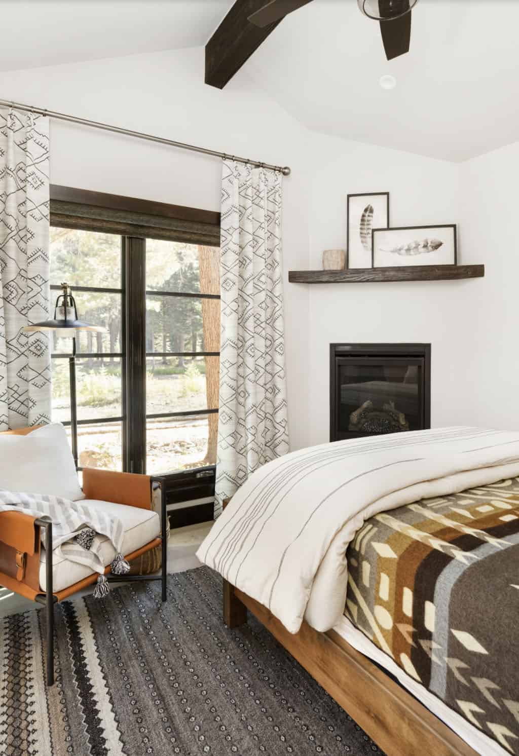 Rustic Bedroom with a Fireplace