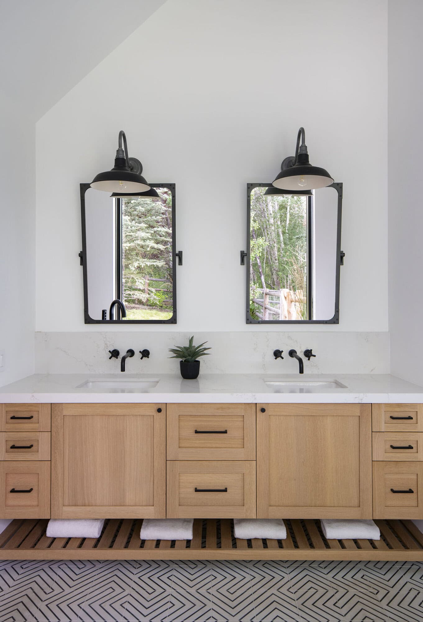 modern bathroom vanity with dual sinks and mirrors