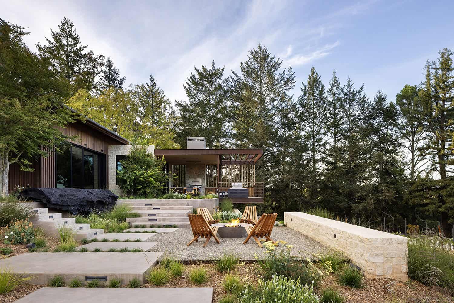 modern farmhouse home exterior with a patio