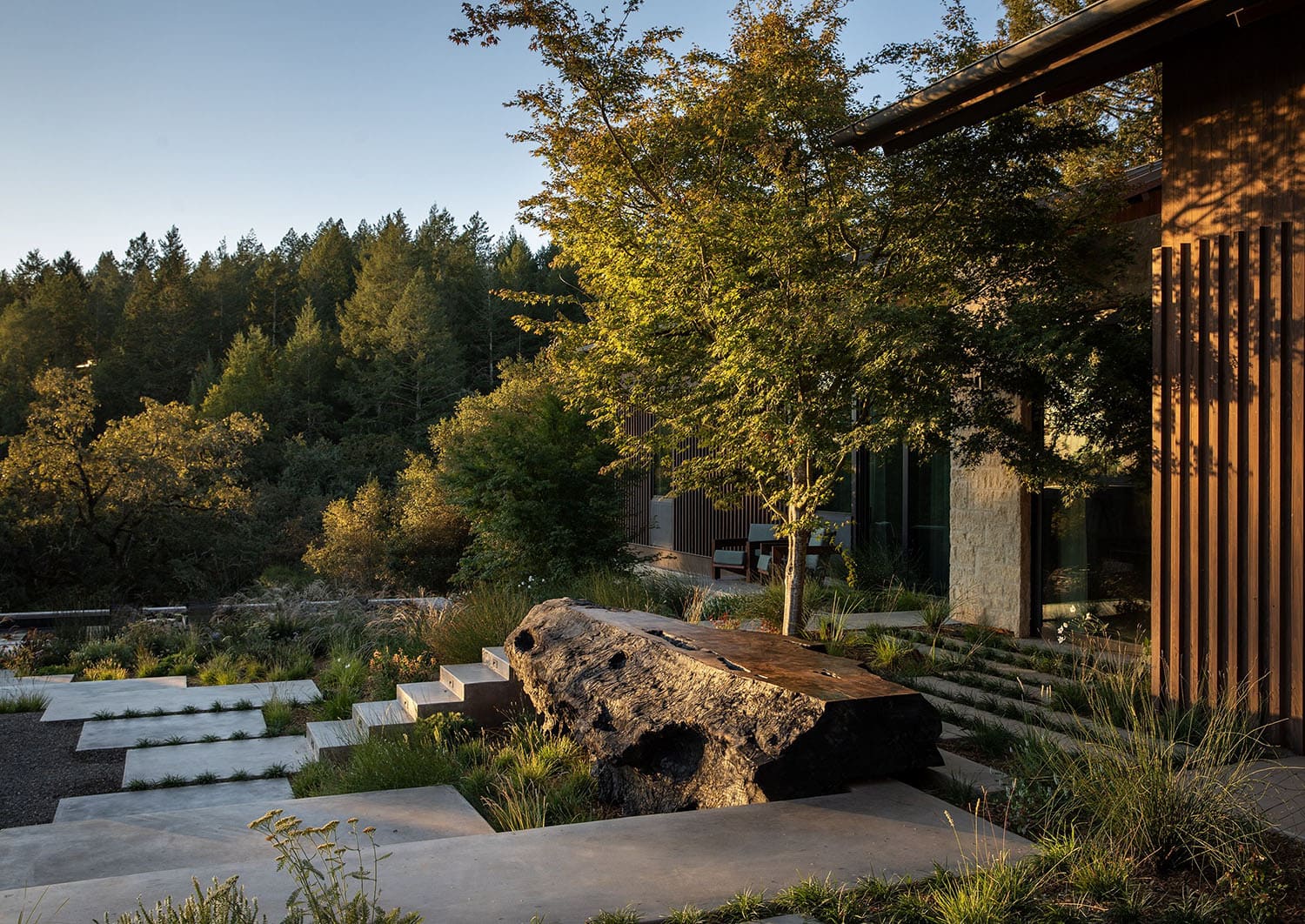 modern farmhouse home exterior with a patio