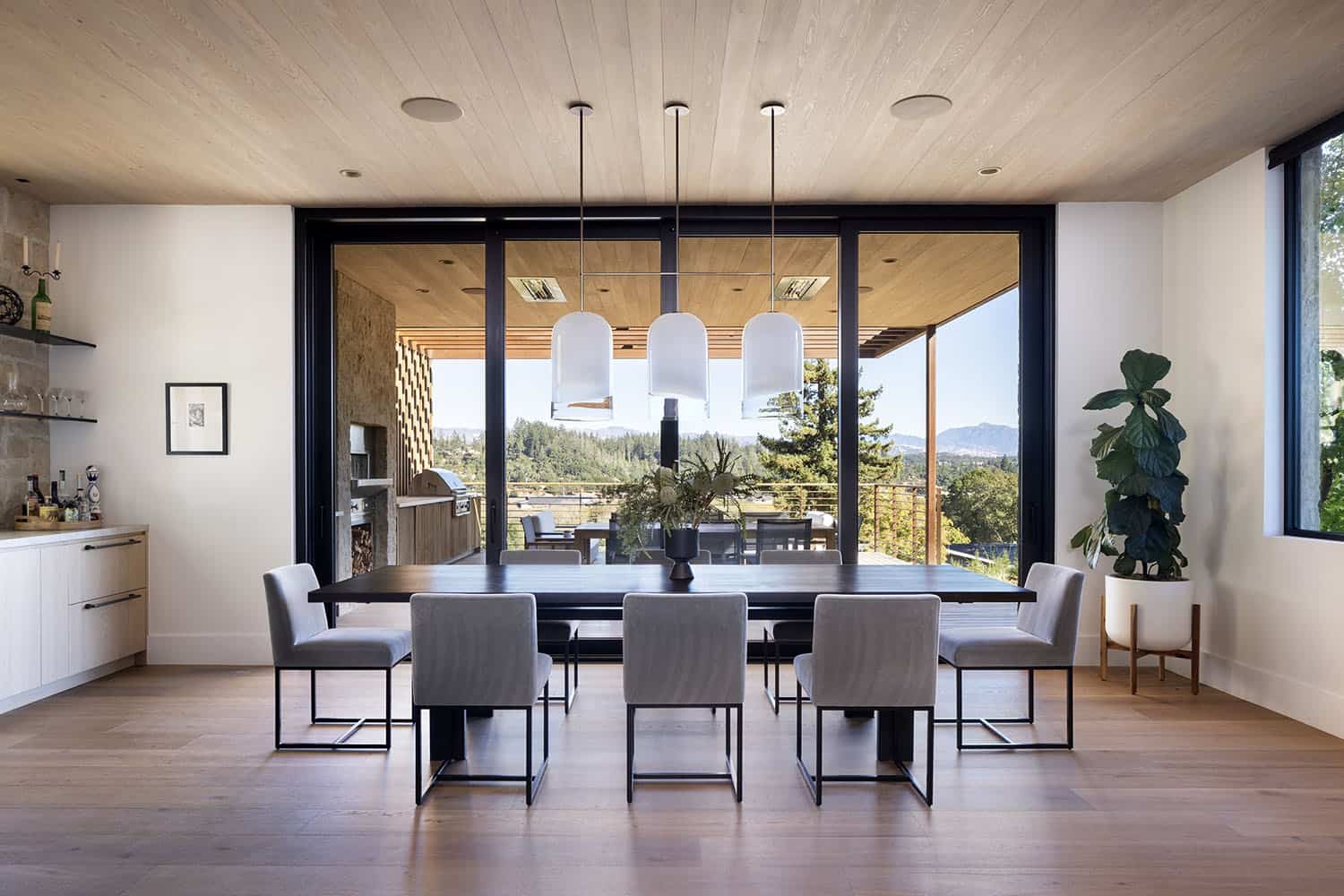 modern farmhouse dining room with sliding glass doors