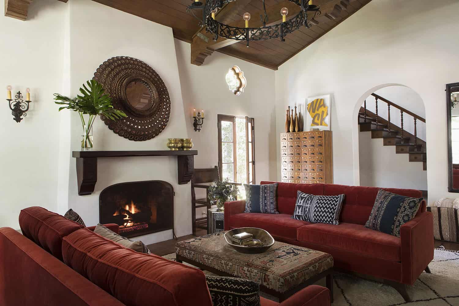 spanish colonial revival living room with a fireplace