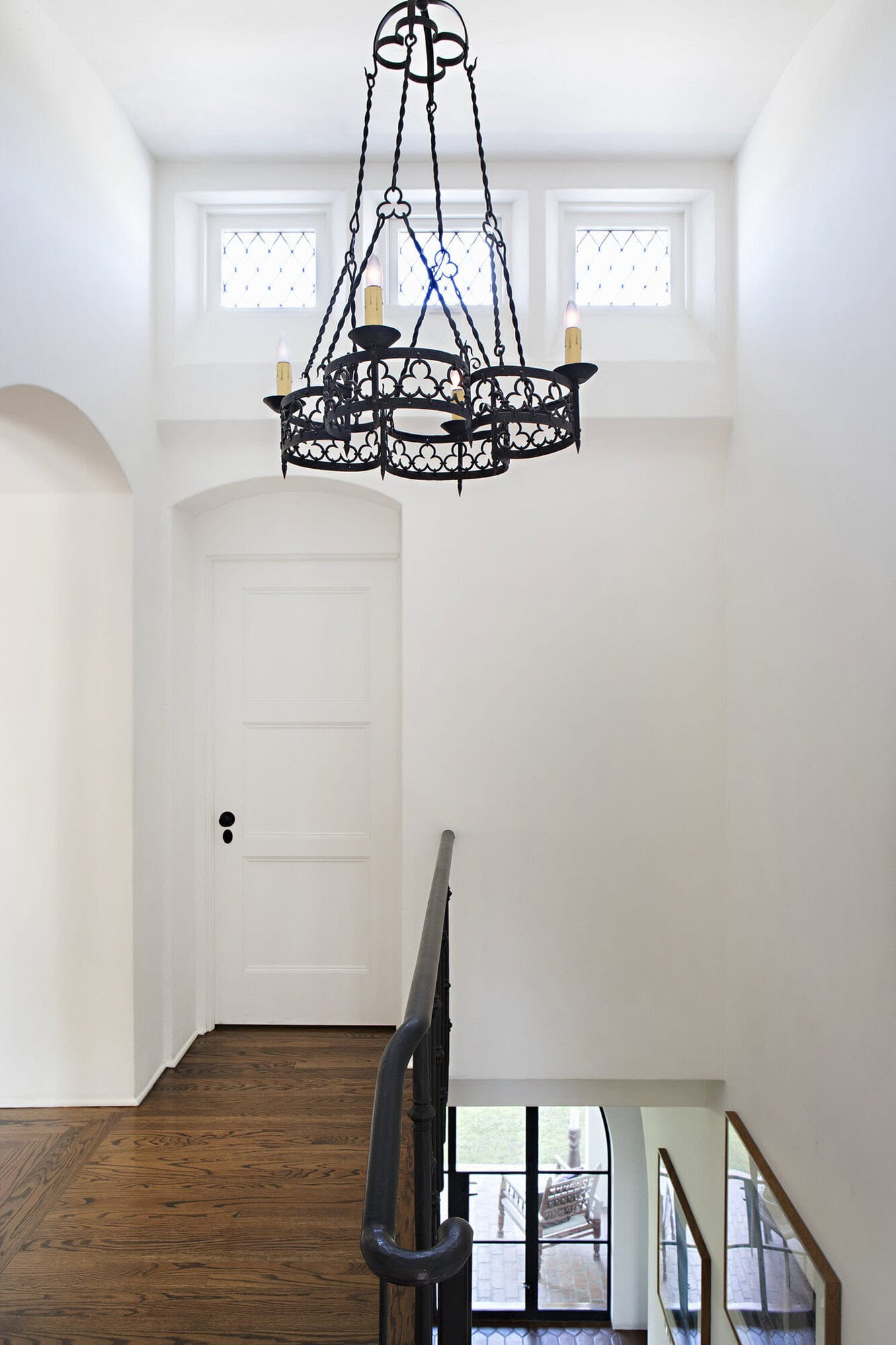 spanish colonial revival upstairs hallway