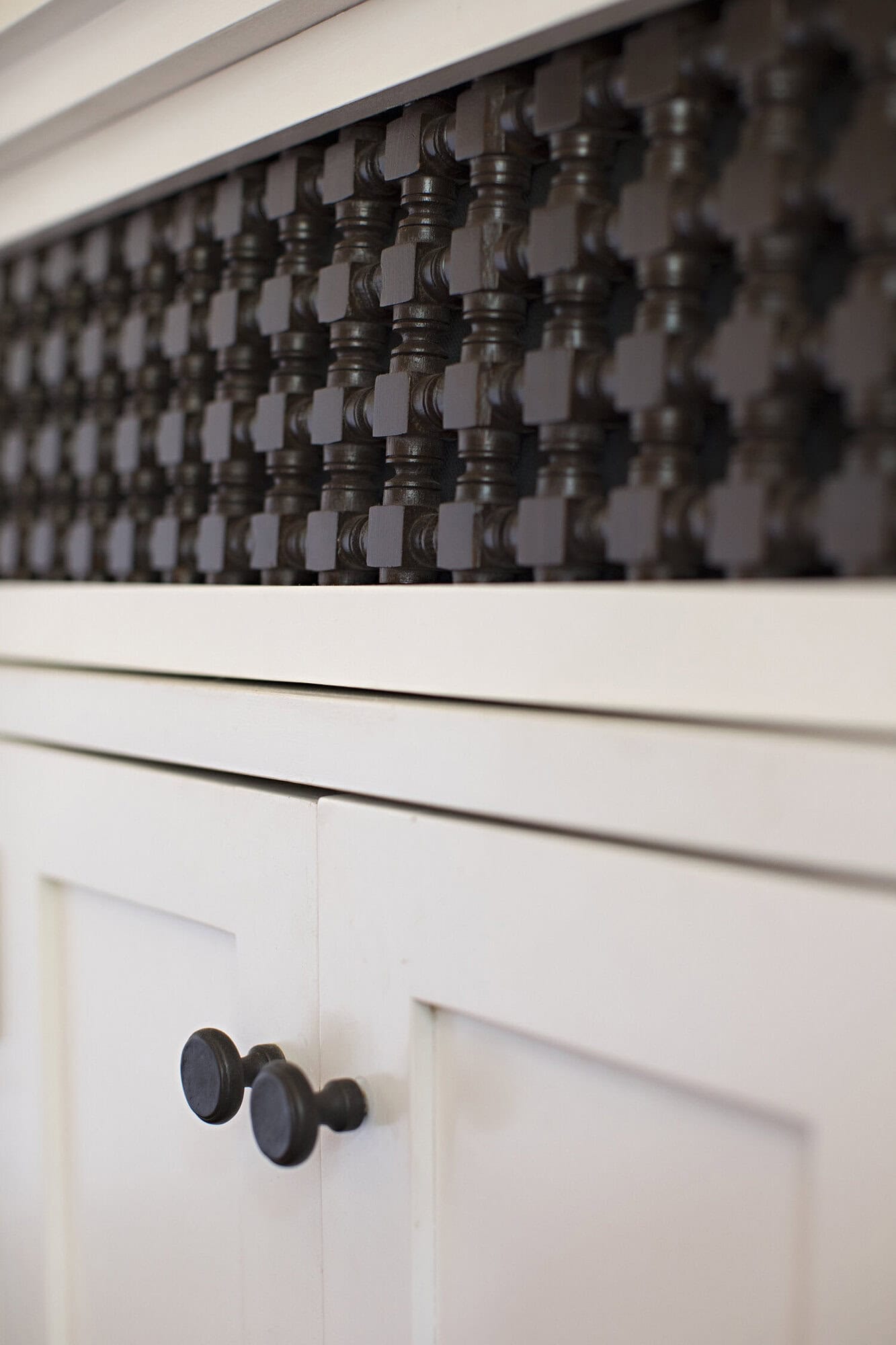 spanish colonial revival cabinet detail
