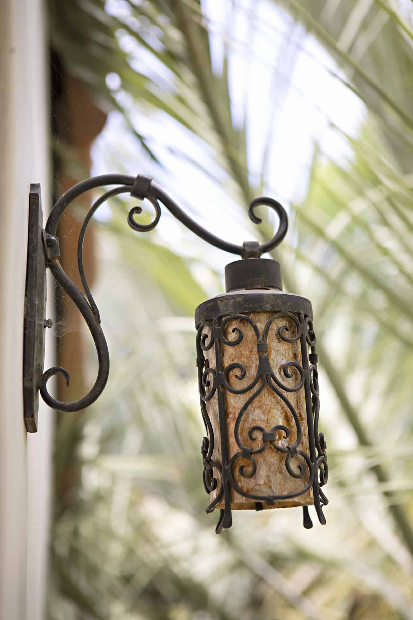 spanish colonial revival home exterior light fixture detail
