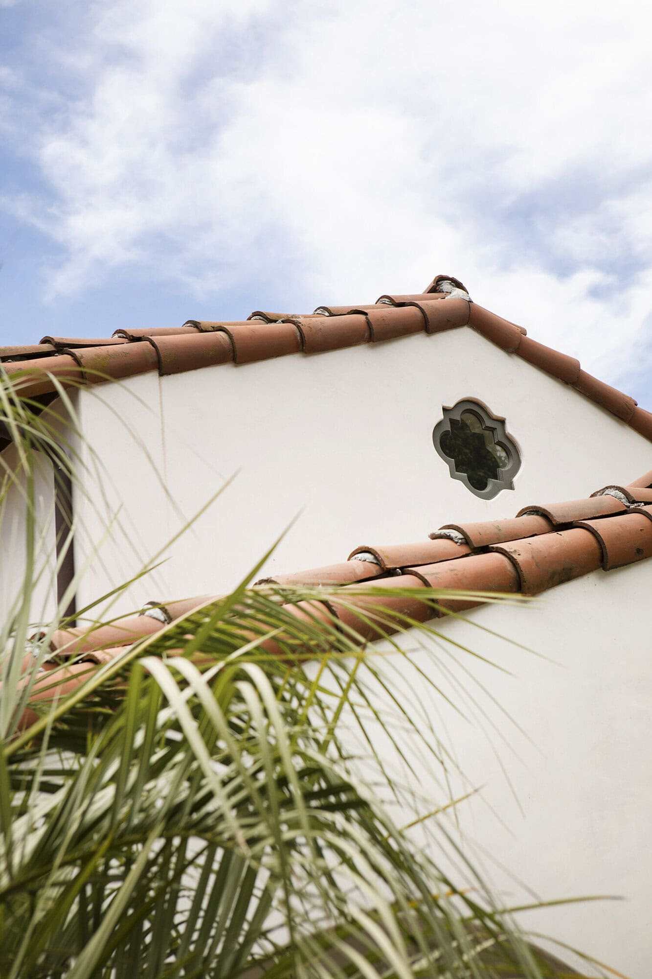 spanish colonial revival home exterior roof detail