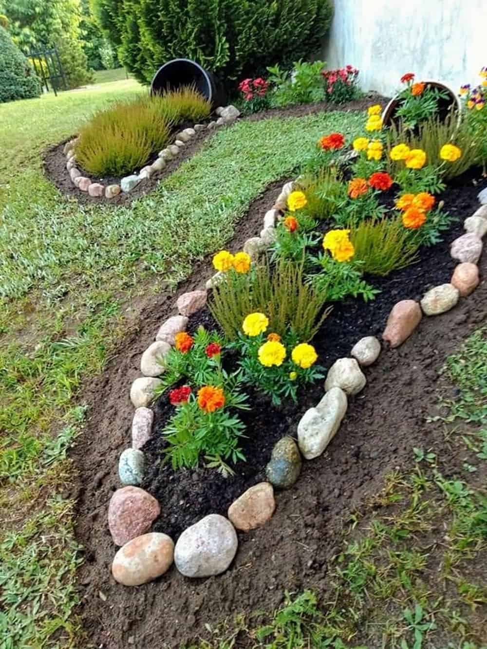 small garden flower beds with tipped pots