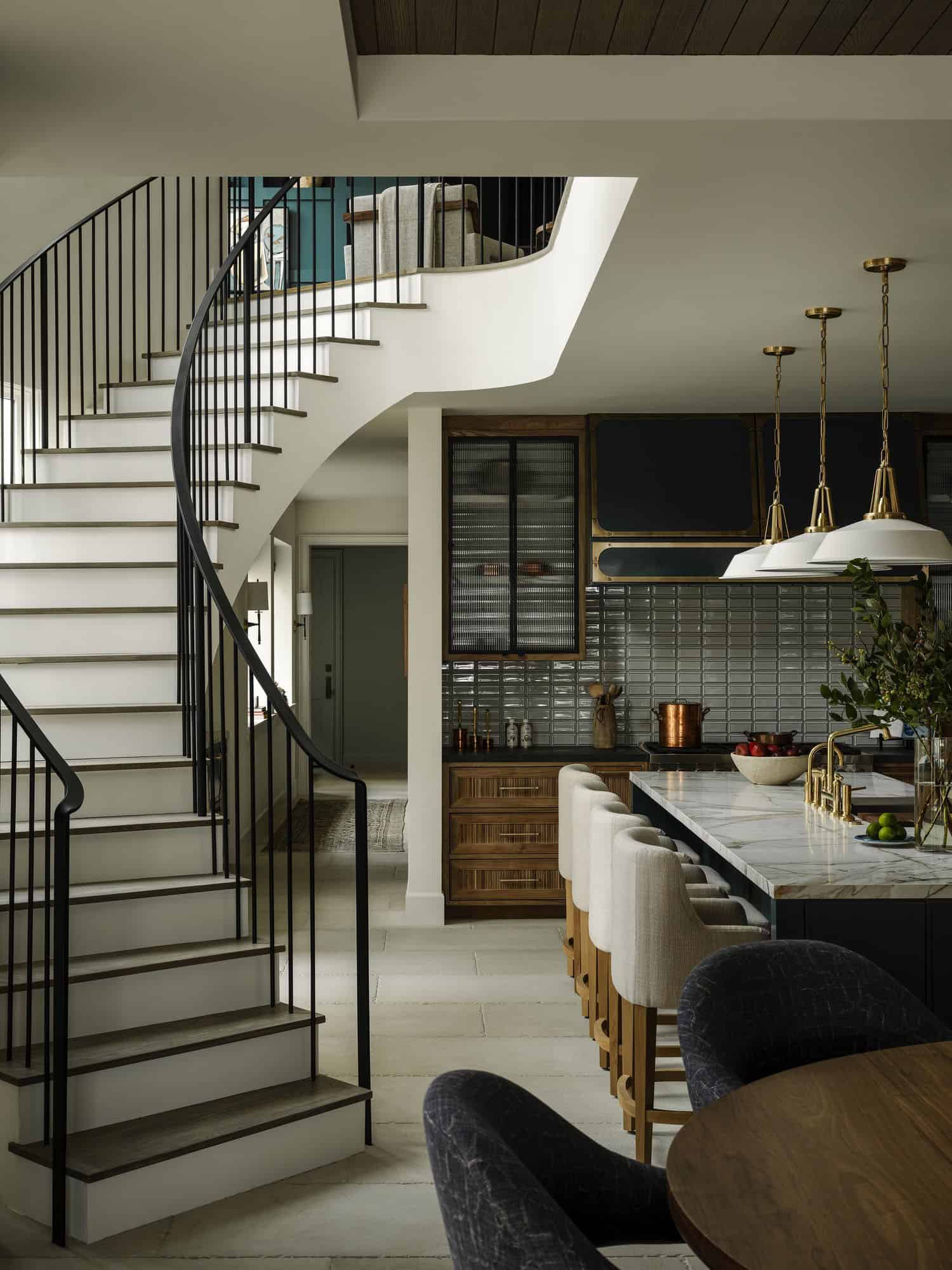 contemporary kitchen with a staircase
