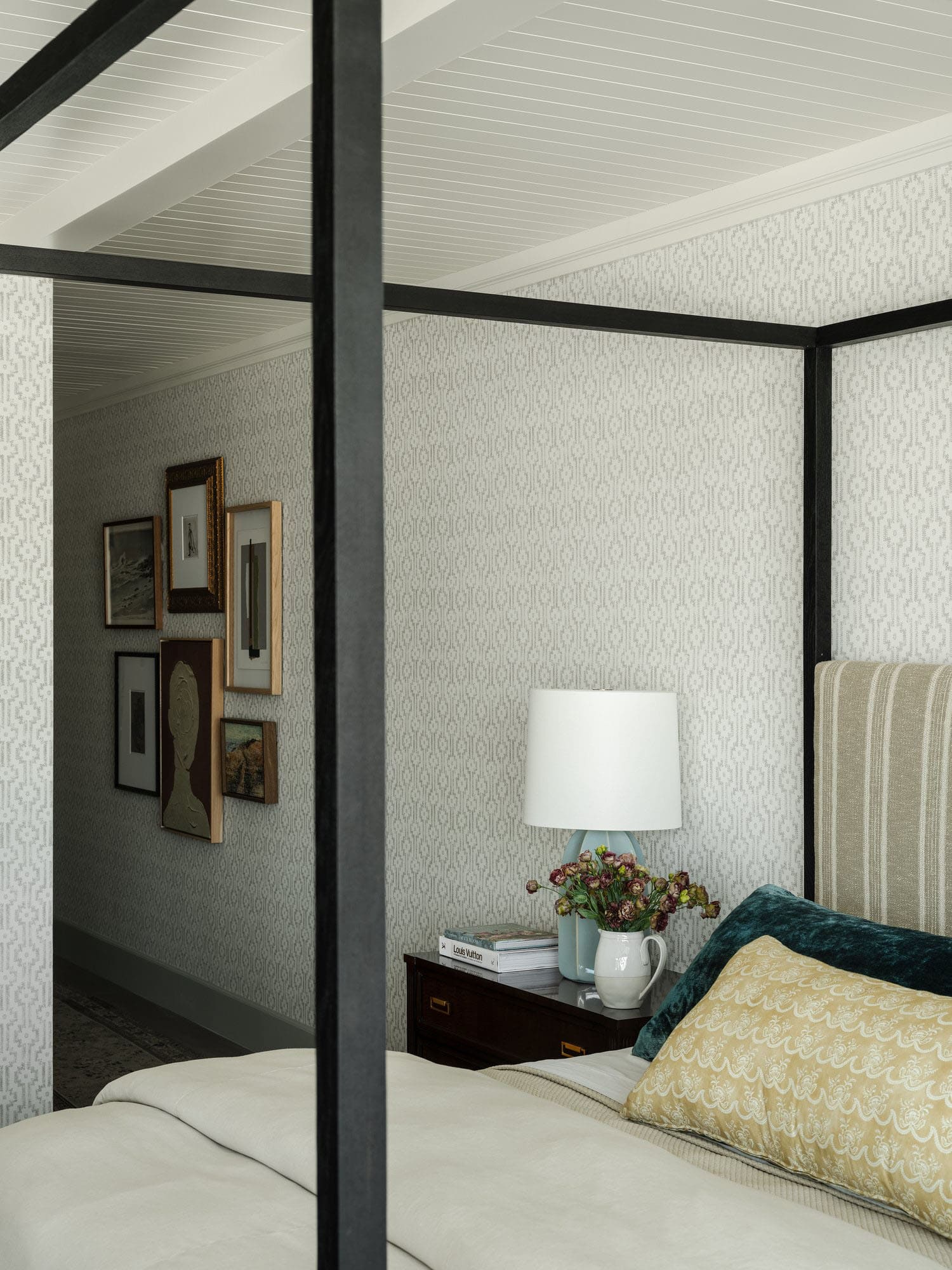 contemporary bedroom with a canopy bed