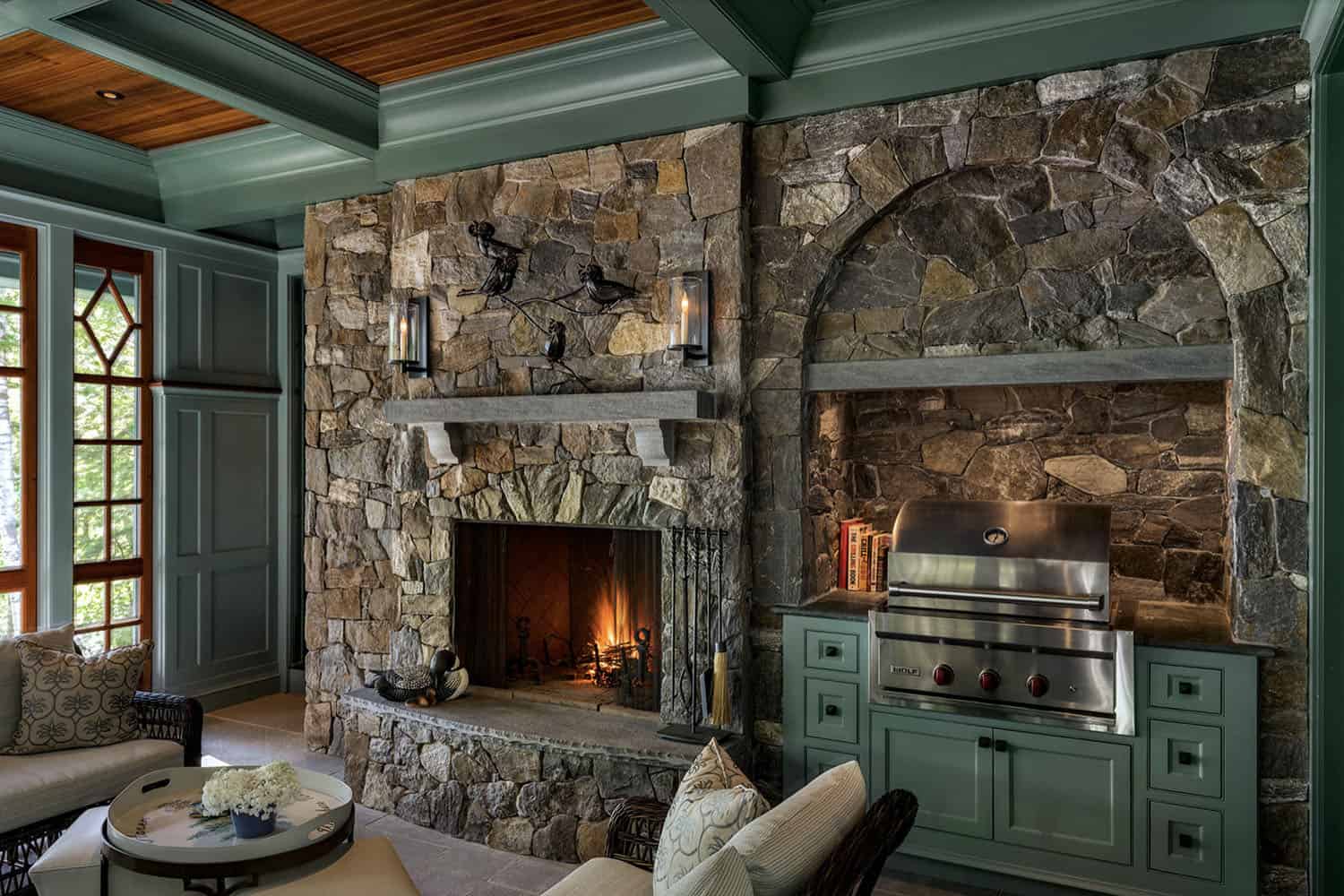 traditional style screened porch with a fireplace
