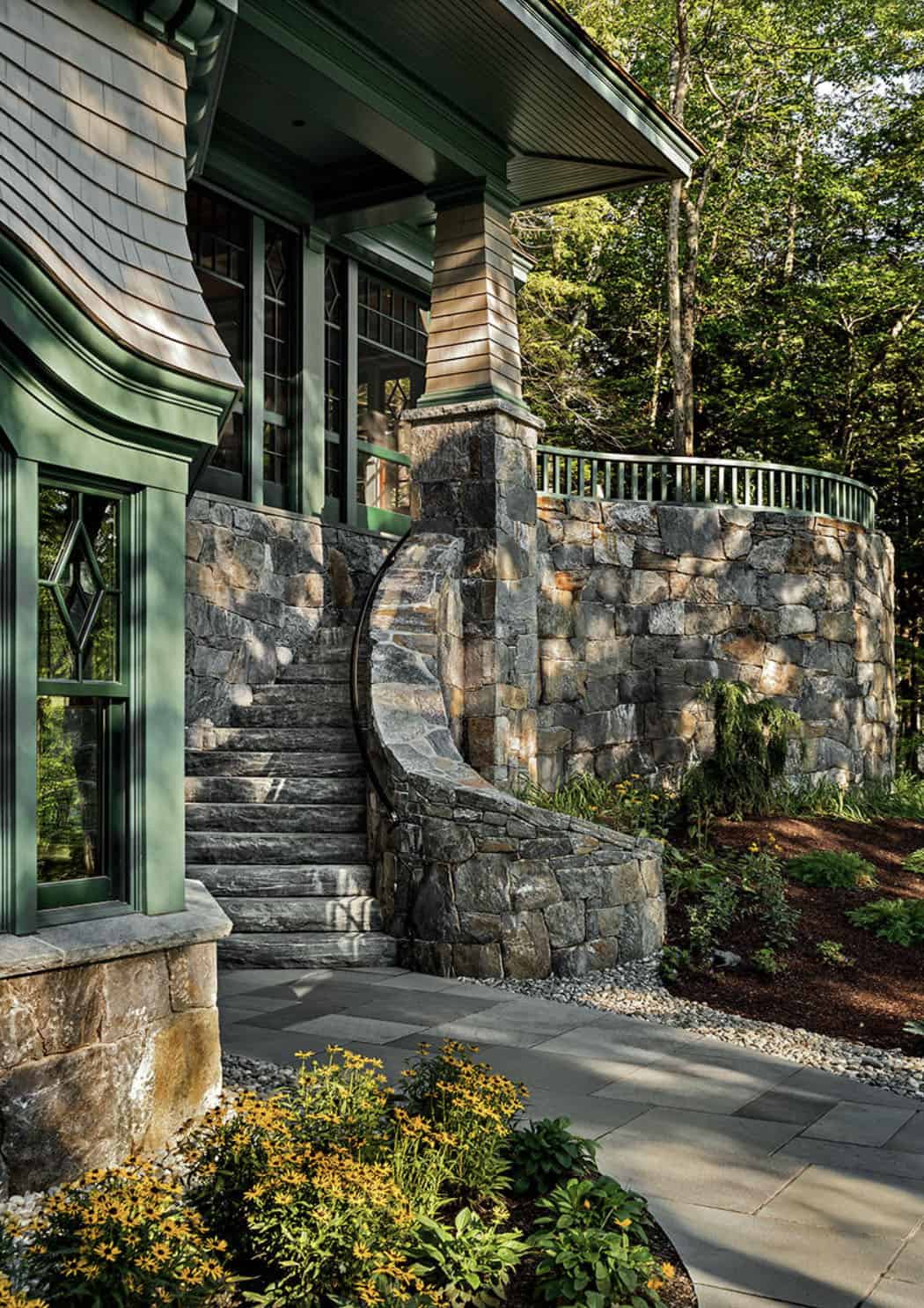 traditional style lake house exterior backyard view