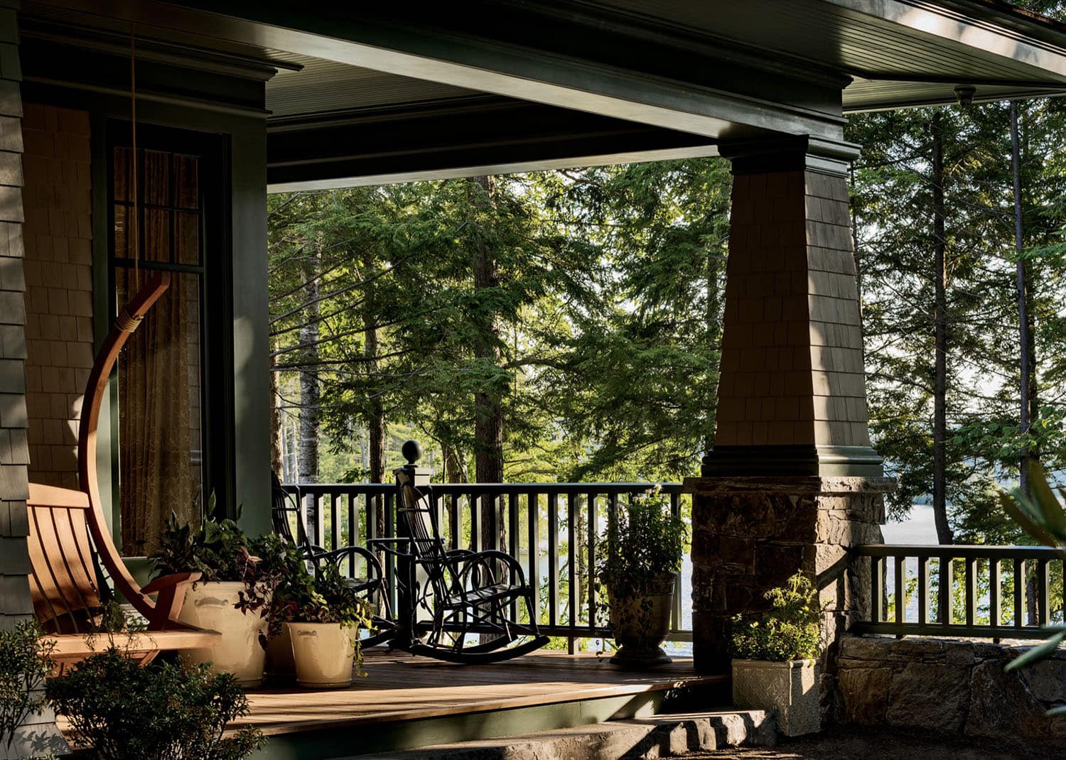 traditional style lake house exterior backyard view