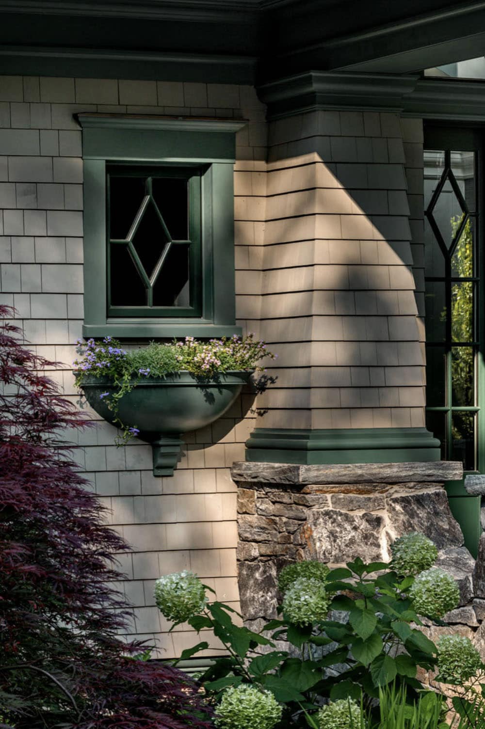 traditional style lake house exterior backyard view