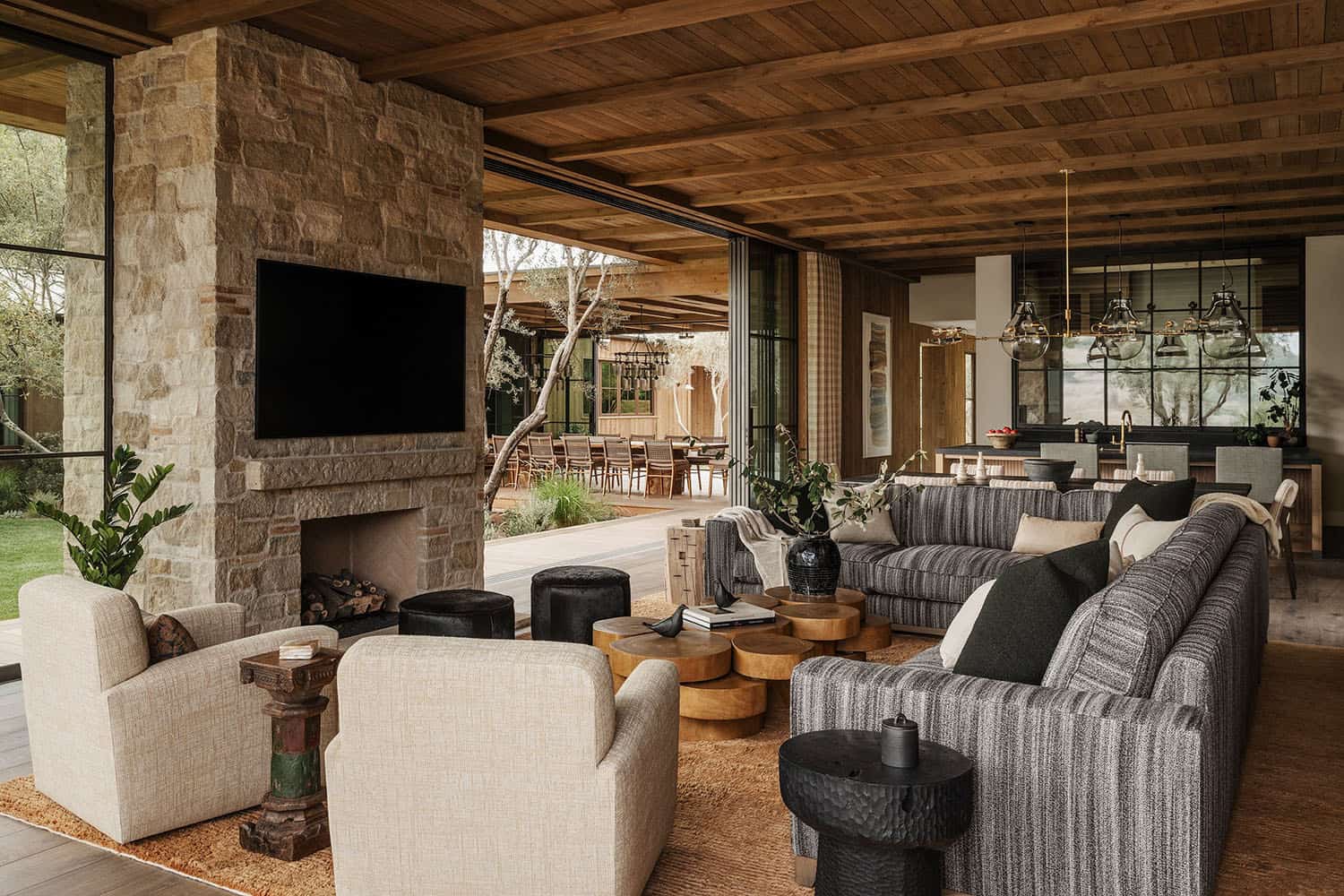 farmhouse style living room with a fireplace