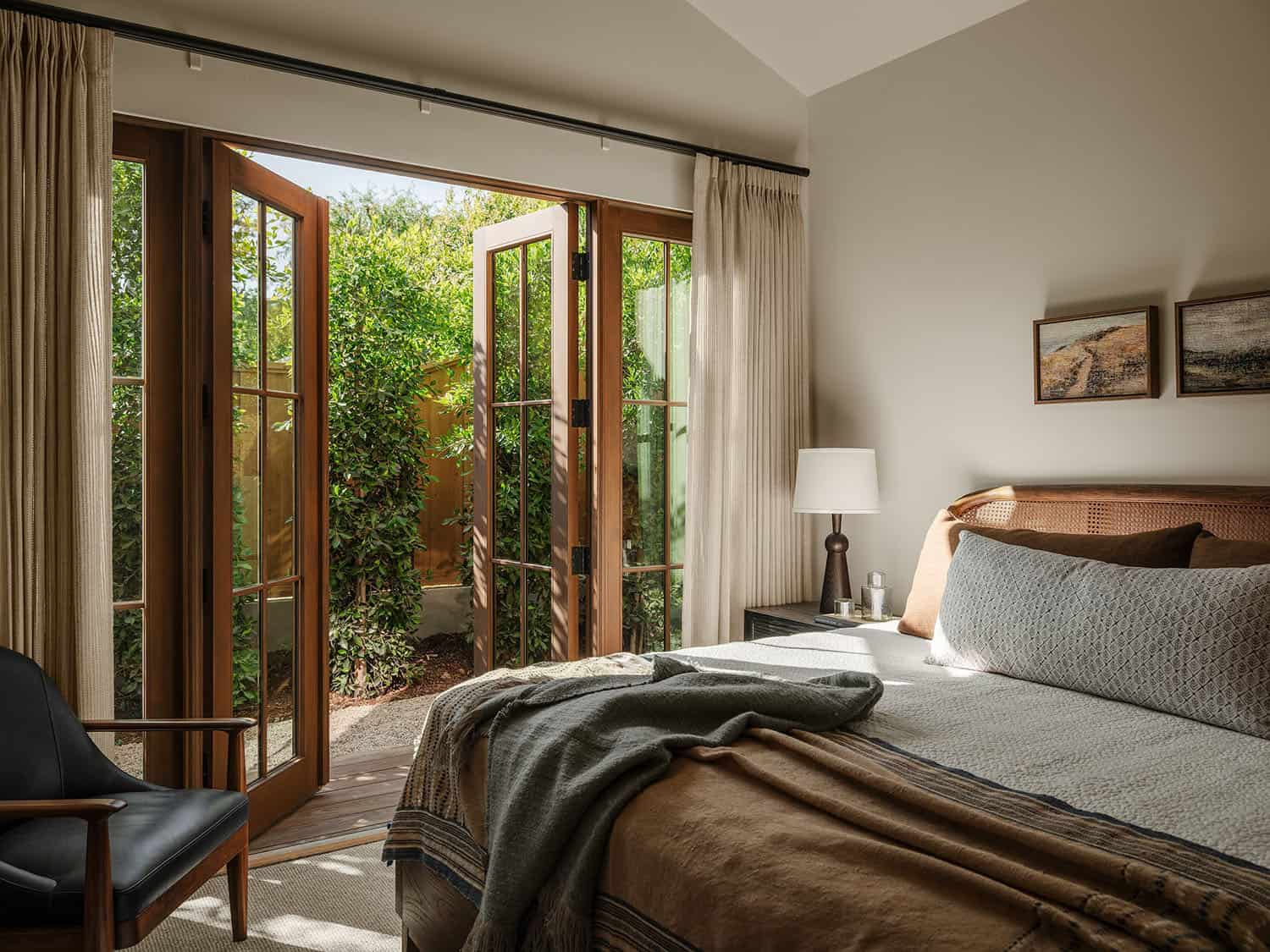 farmhouse style bedroom with french doors