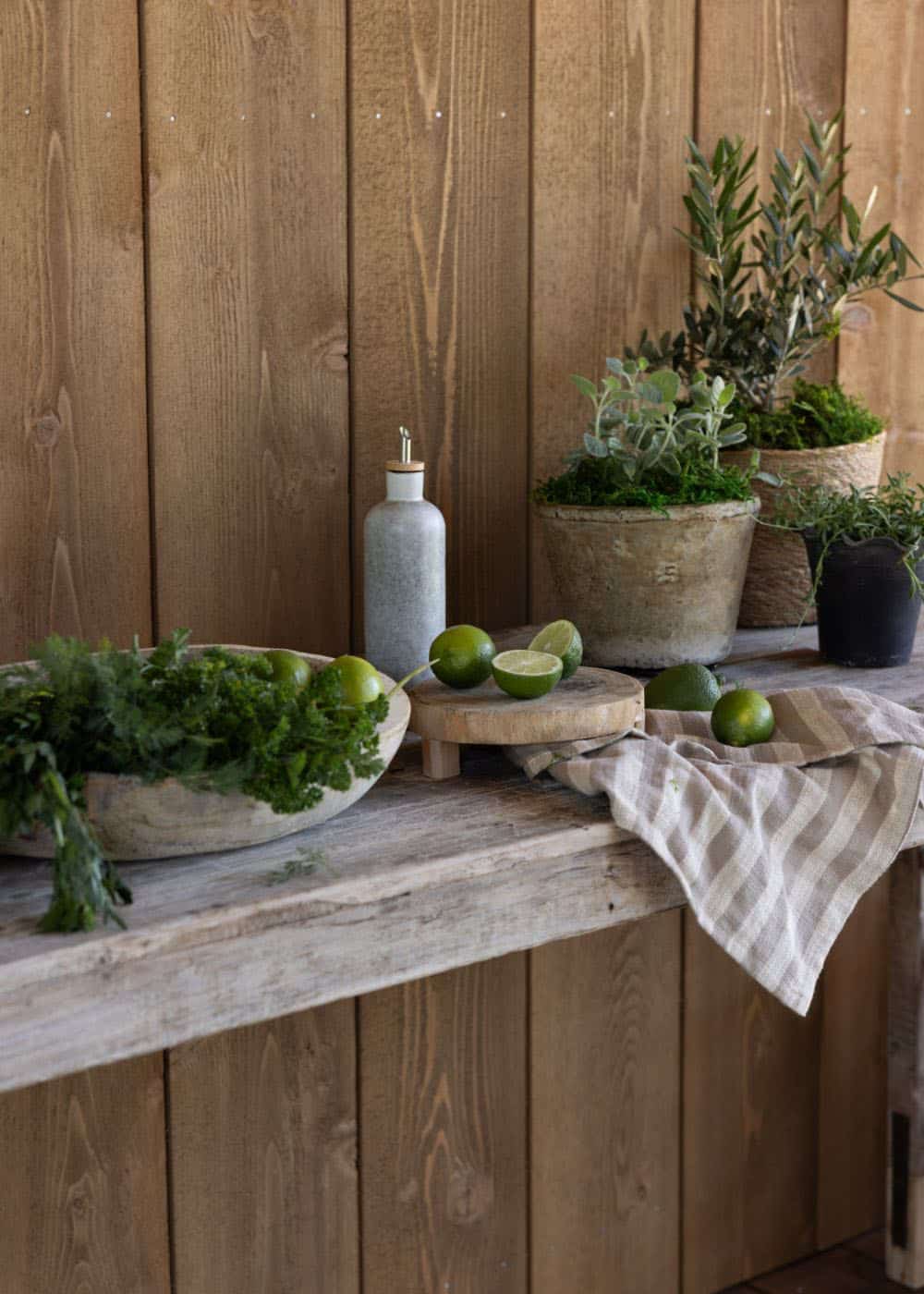 farmhouse style home outdoor bench with pots