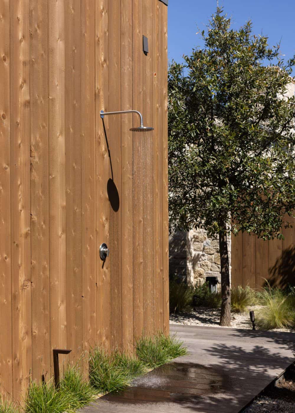 farmhouse style home exterior with an outdoor shower