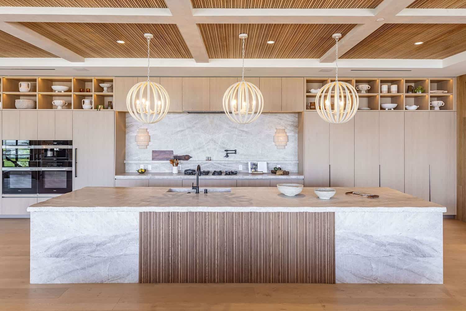 modern kitchen with large pendant lights