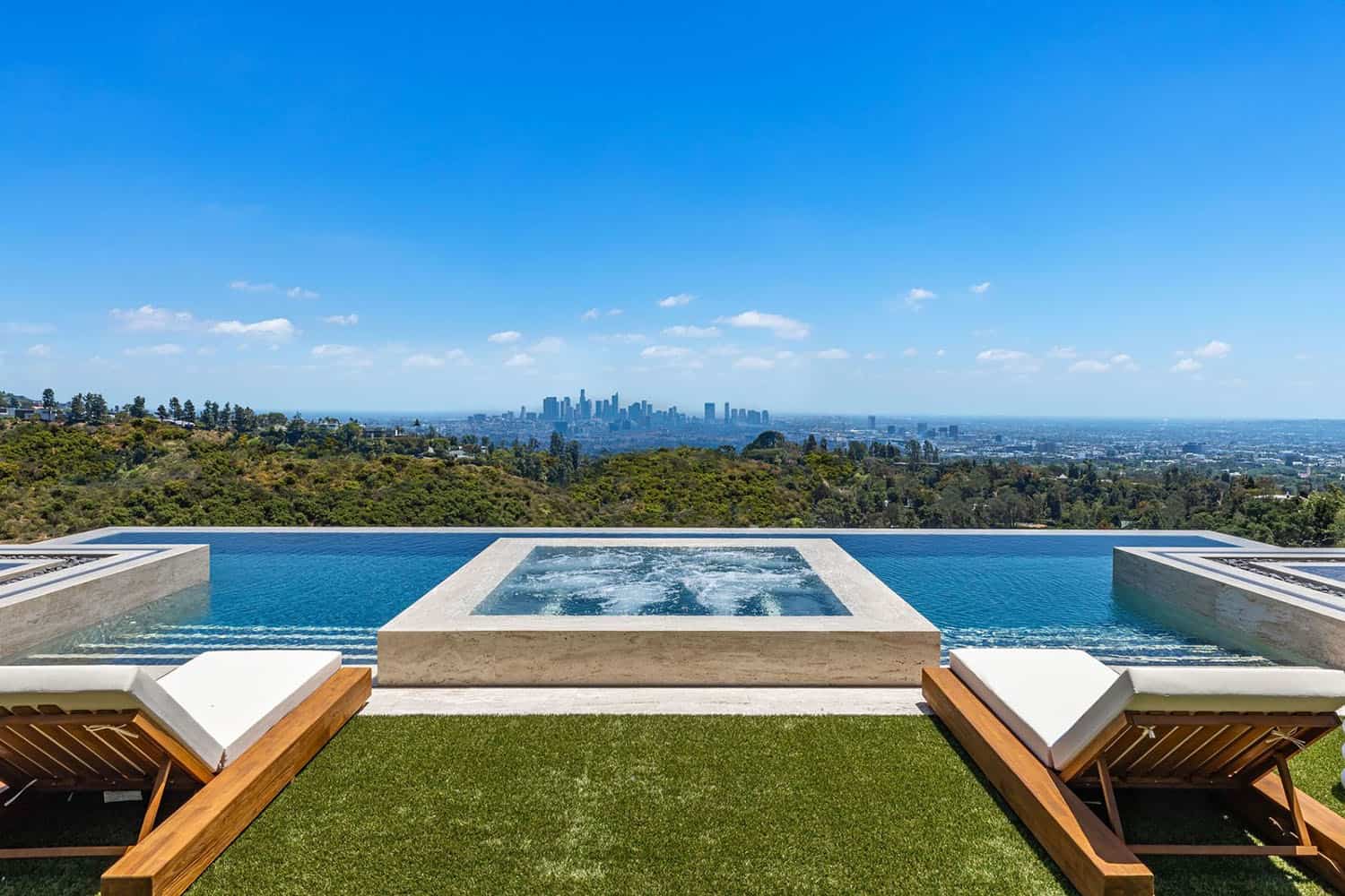 hillside home patio with a pool and a view over Beverly Hills