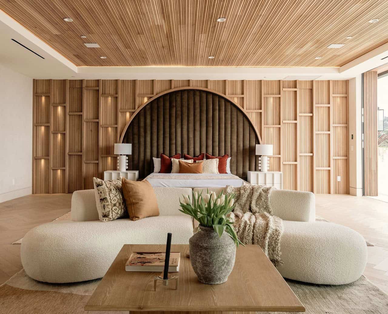 modern bedroom with a wood ceiling treatment