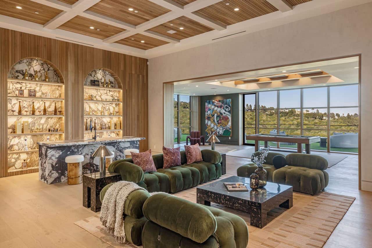 modern lower-level family room with a home bar