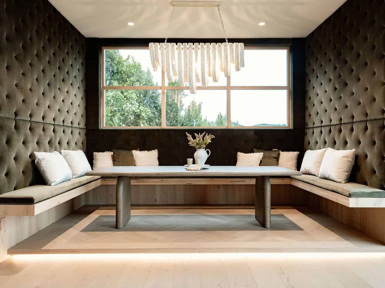 modern lounge room with a large chandelier