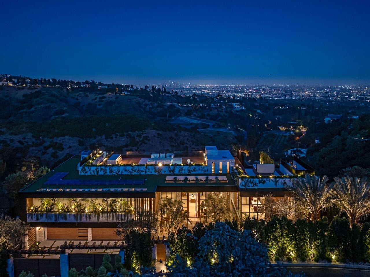 hillside home exterior at dusk