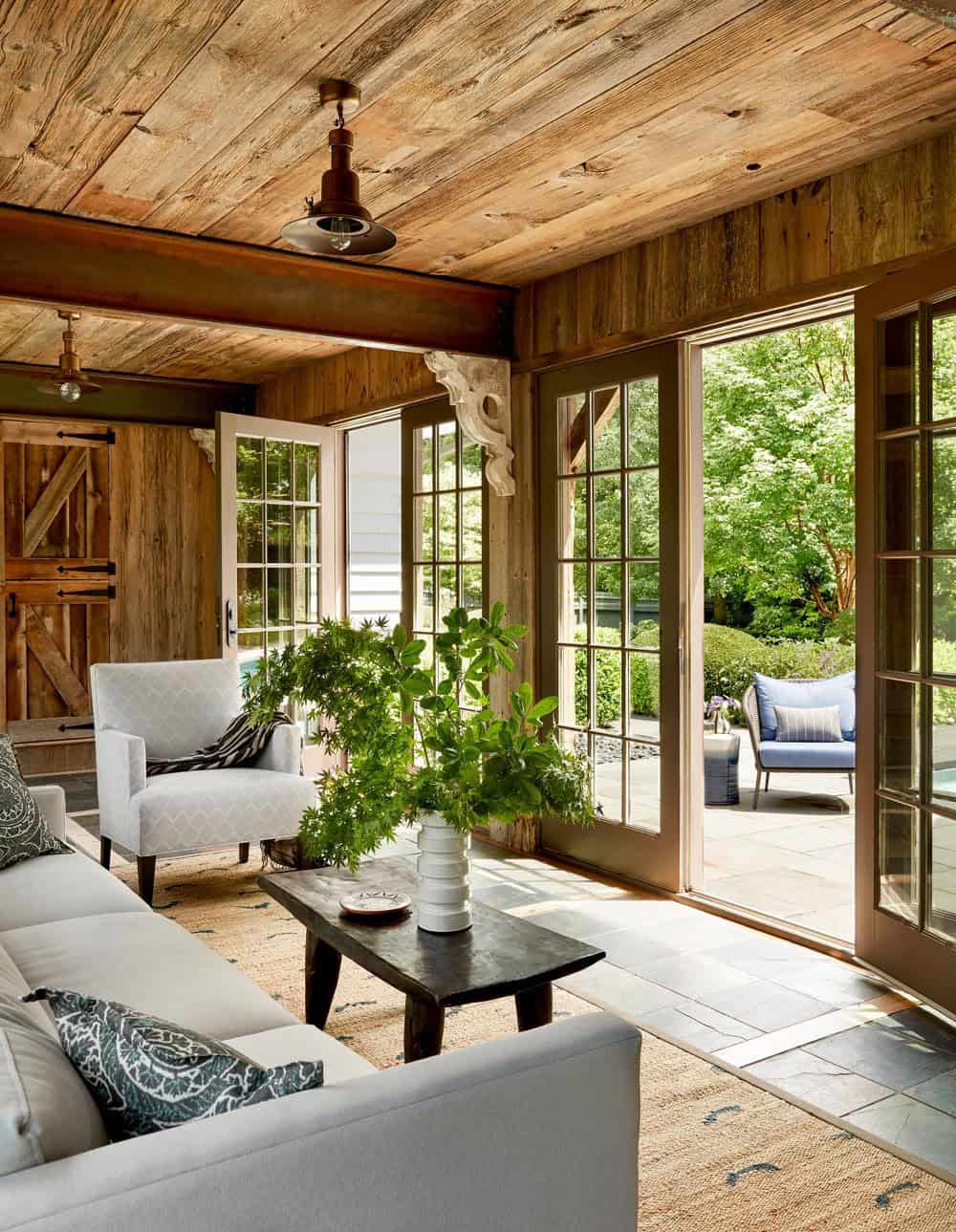 farmhouse style covered porch with outdoor furniture