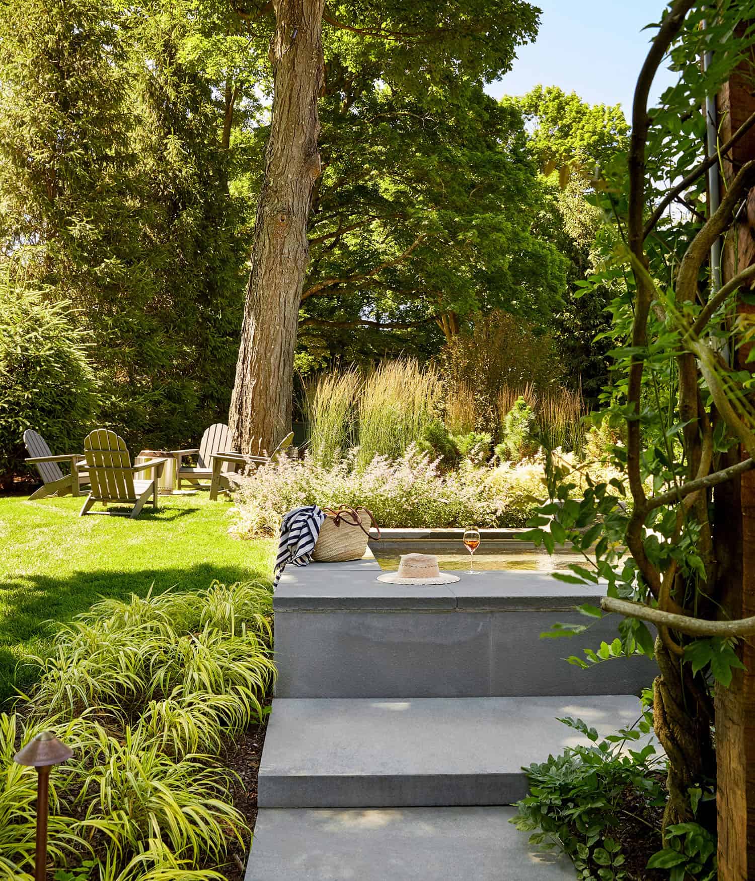 farmhouse style home landscape with a spa