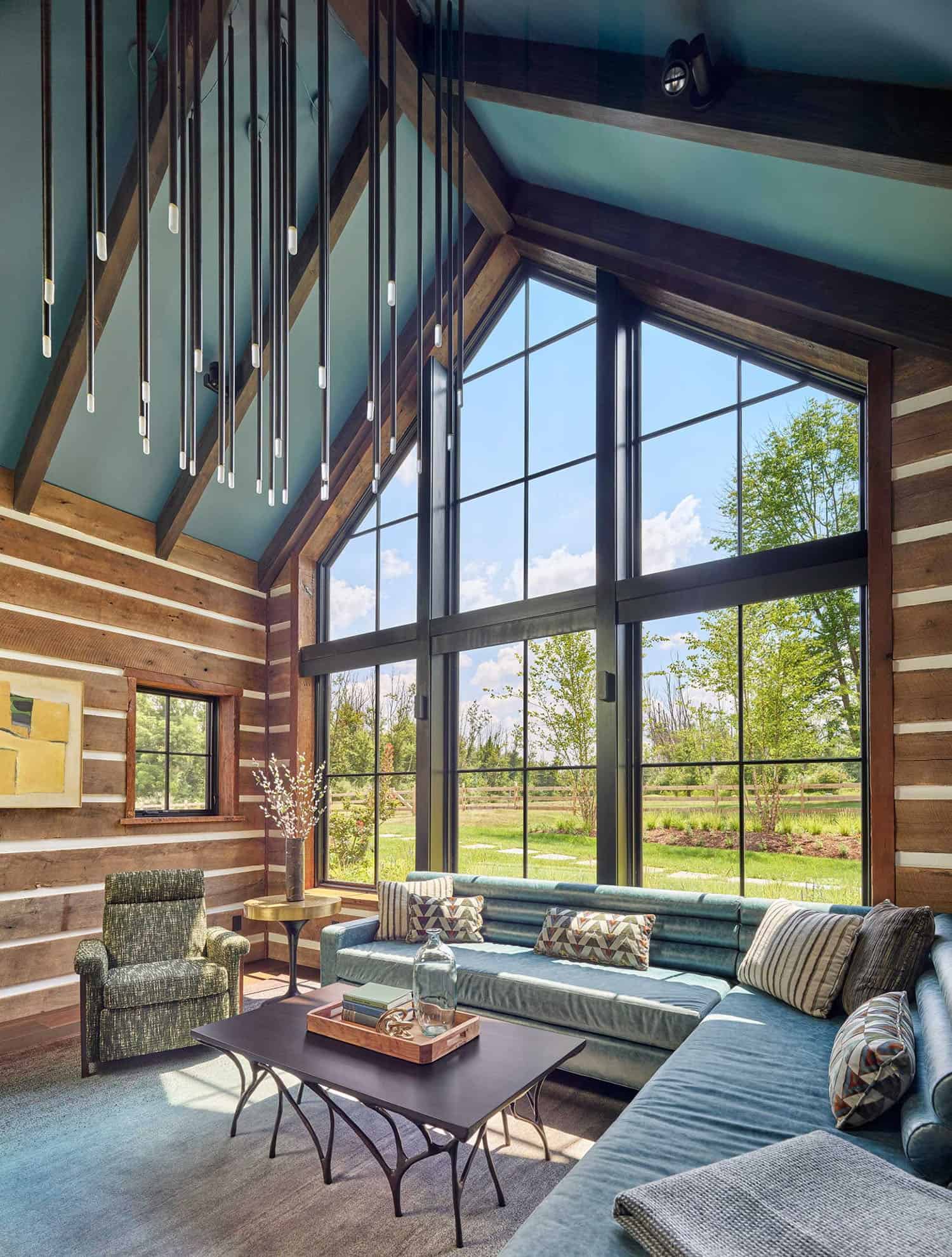 contemporary farmhouse style family room with a large window