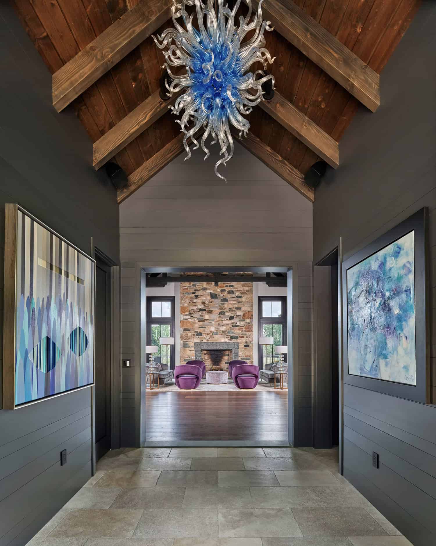 contemporary farmhouse home entry with a vaulted ceiling
