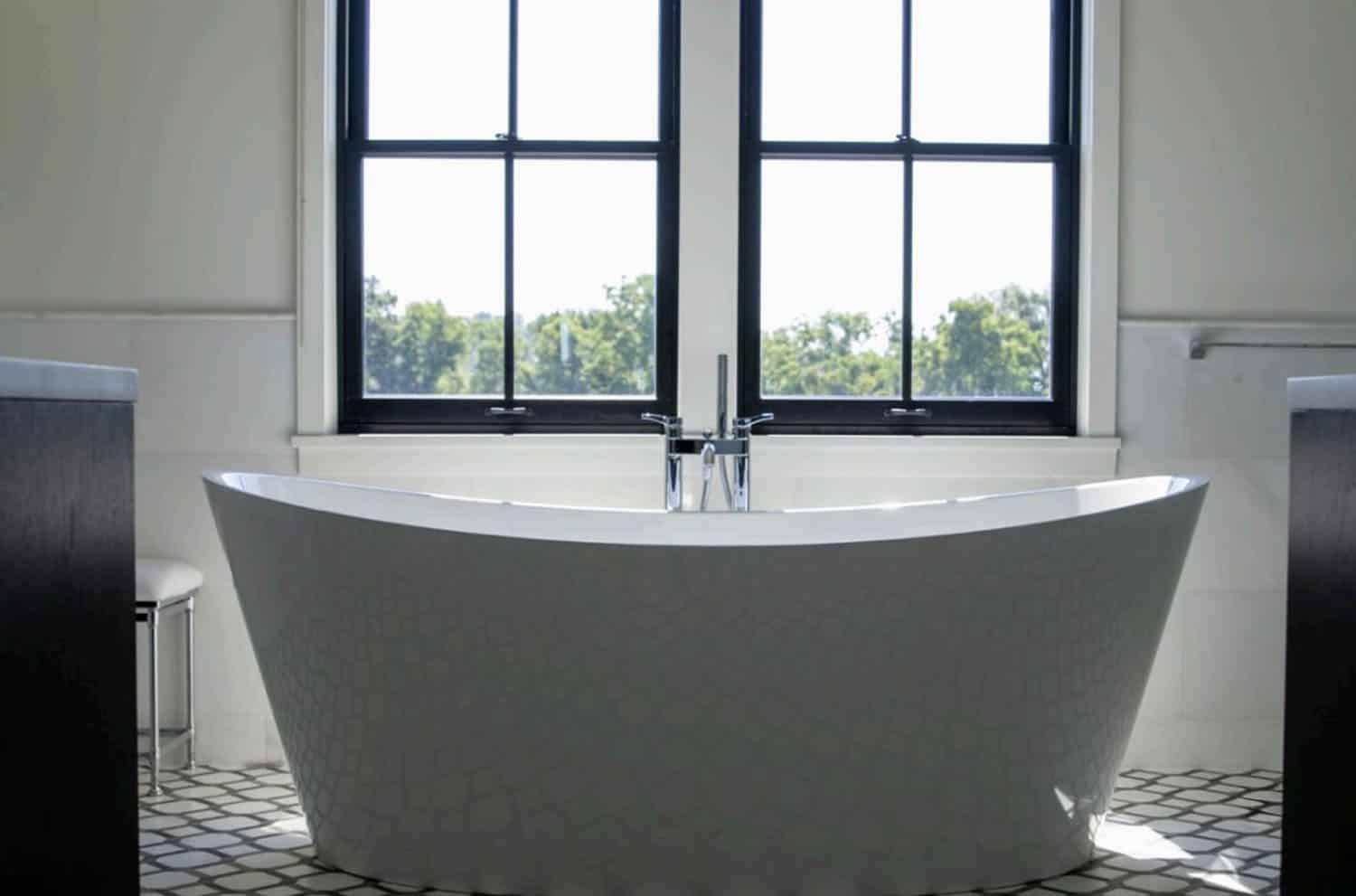 contemporary farmhouse style bathroom with a freestanding tub