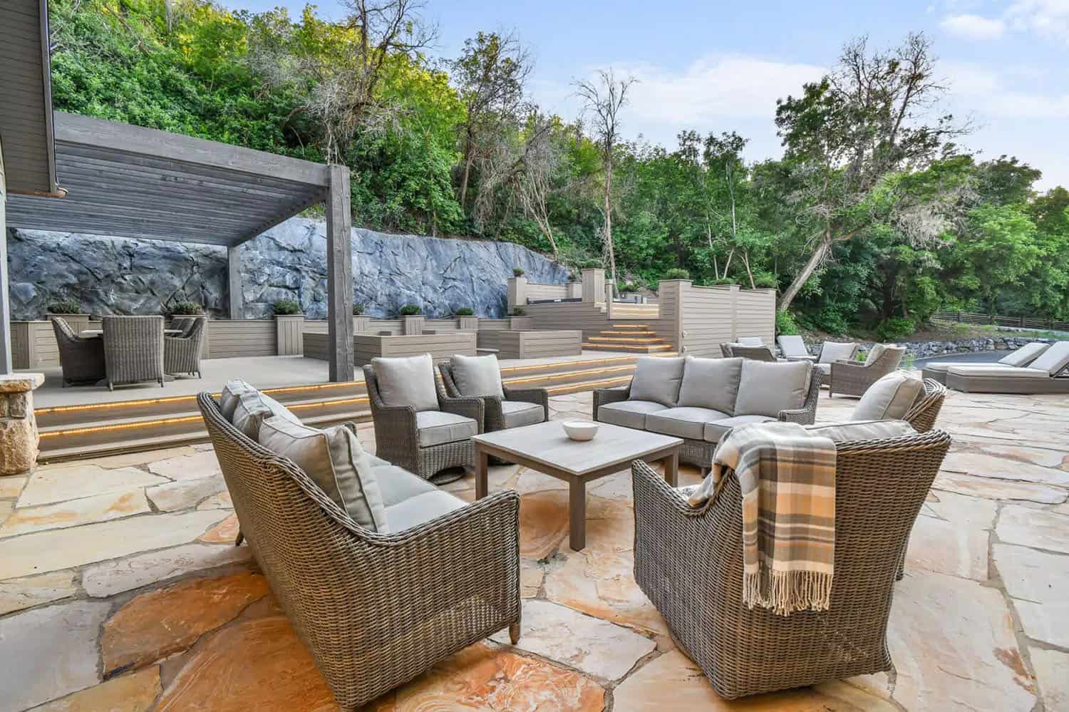 contemporary french country home patio with outdoor furniture