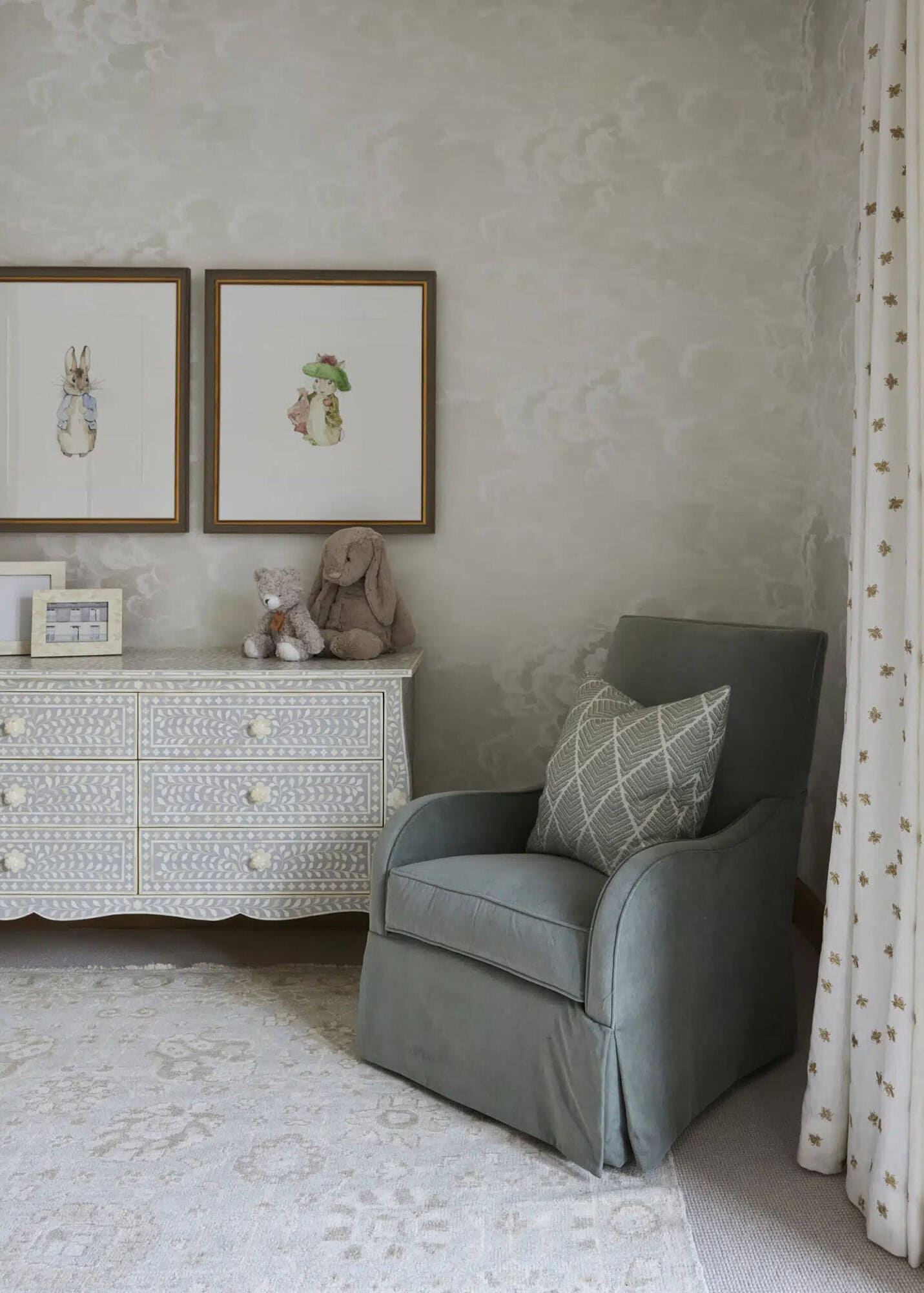 contemporary french country nursery with a reading chair