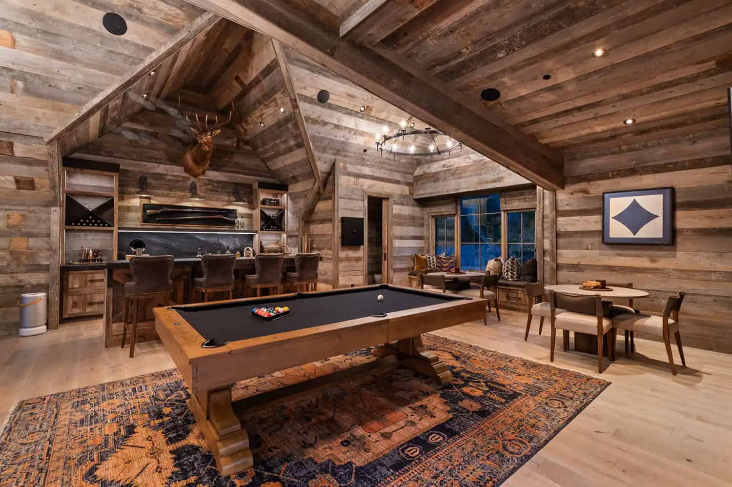 rustic speakeasy-style family room with a pool table